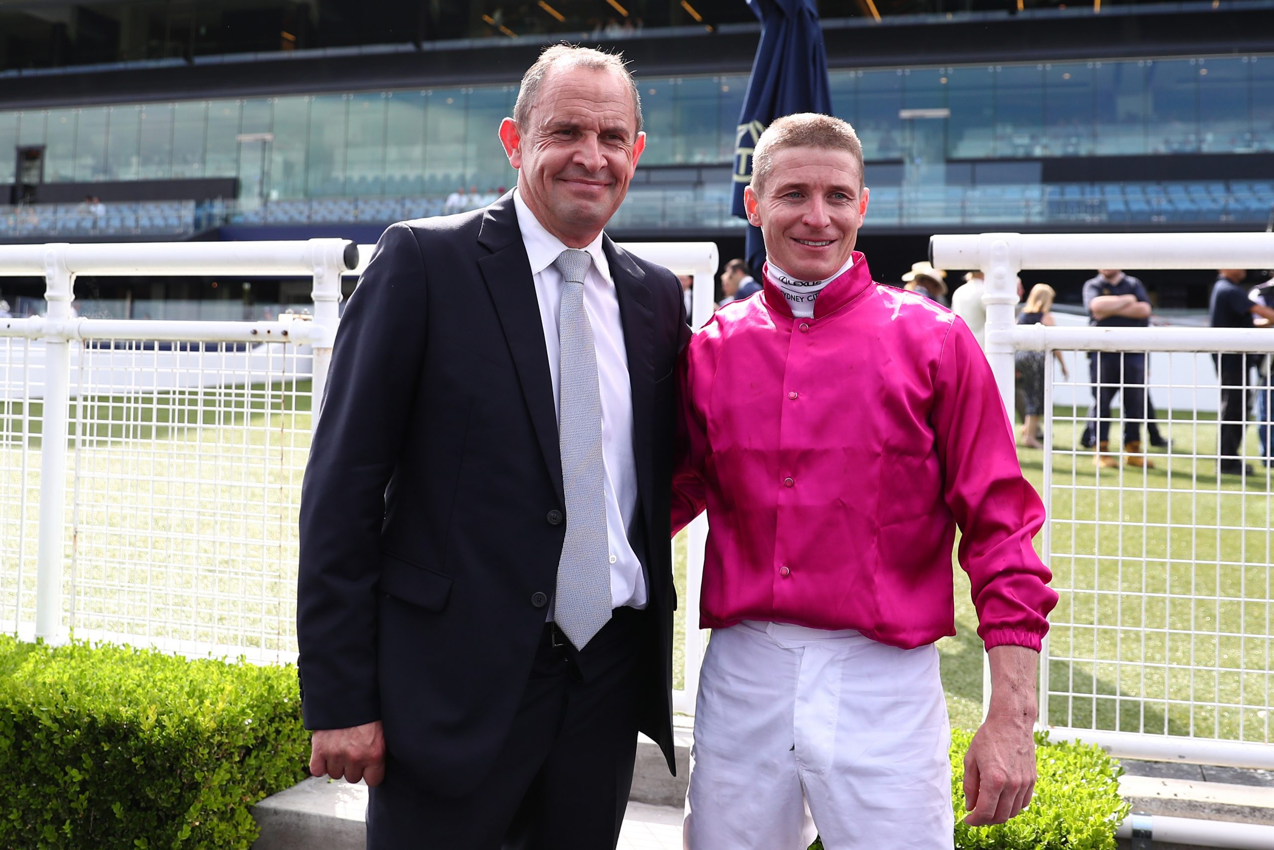 Trainer Chris Waller celebrates after James Mcdonald rides Fangirl to Apollo Stakes victory.