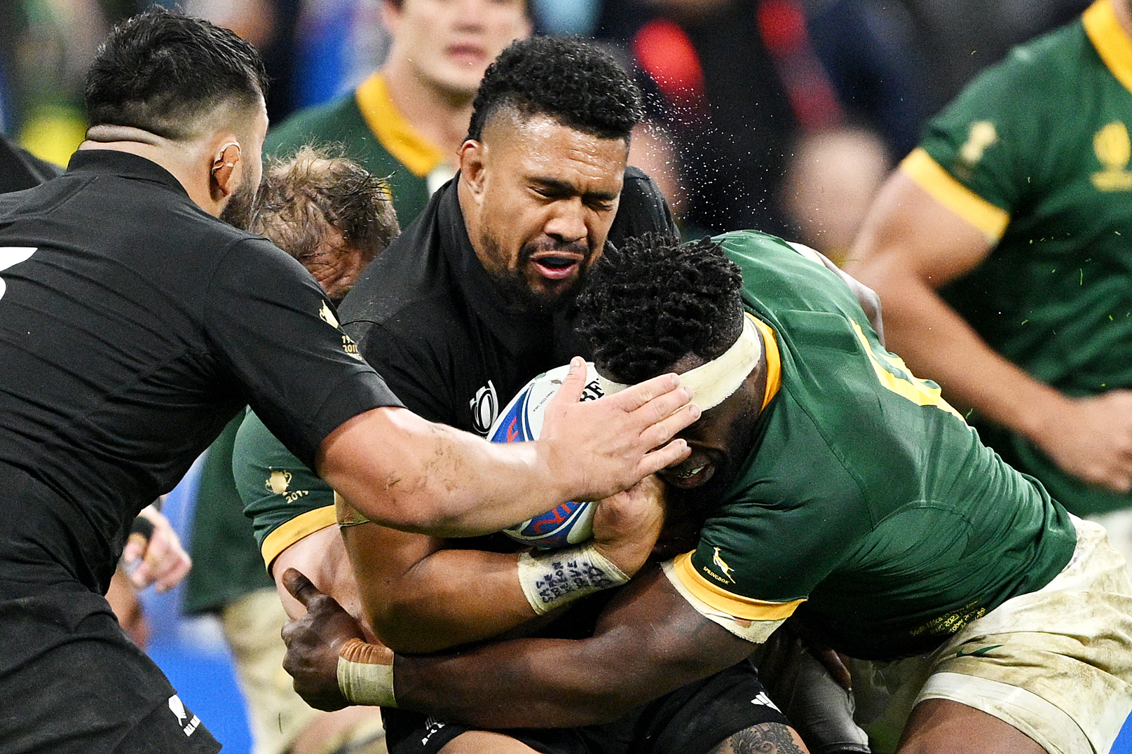 Siya Kolisi of South Africa commits a high tackle with head contact on Ardie Savea of New Zealand.