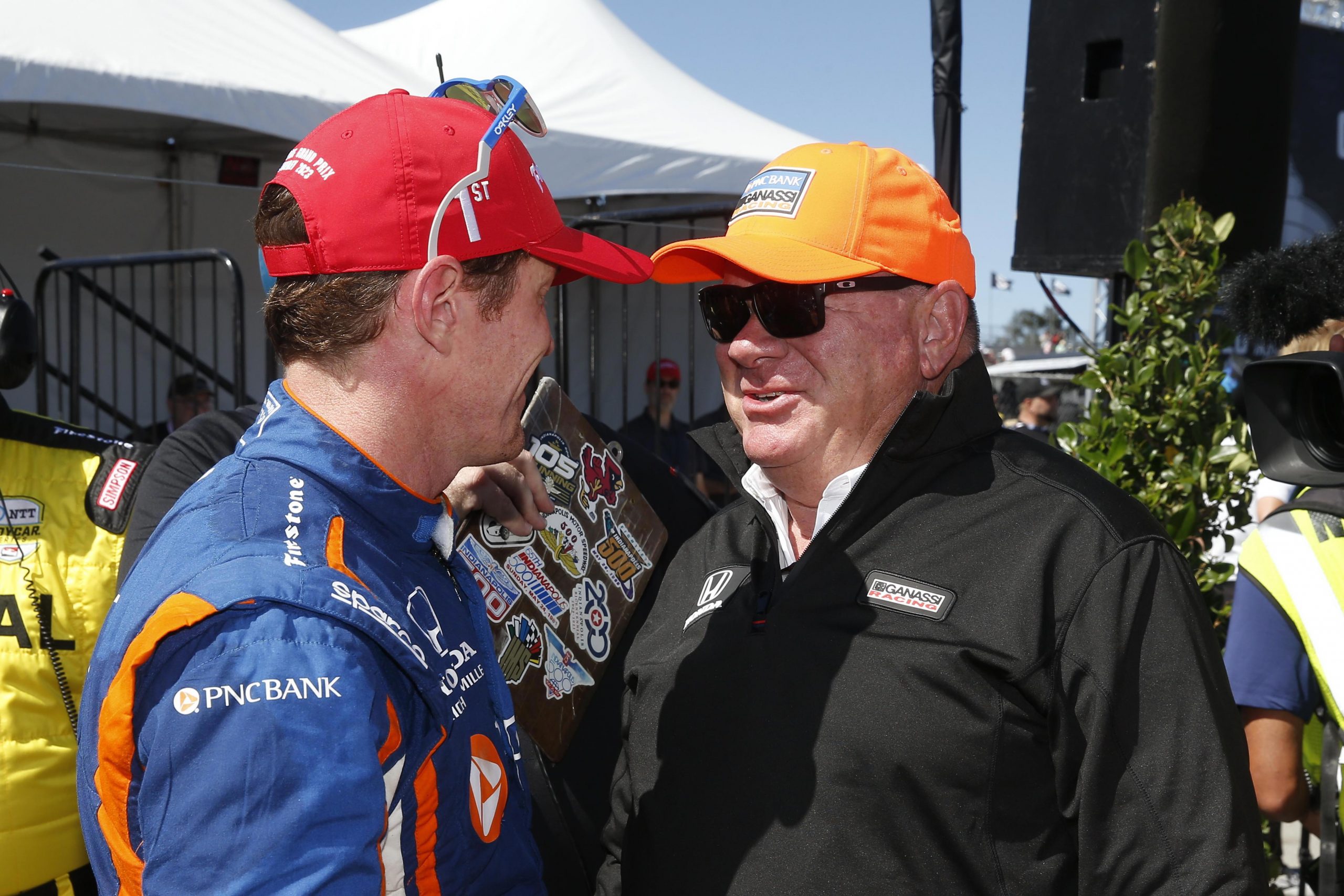 IndyCar team owner Chip Ganassi (right) with six-time winning champion Scott Dixon.