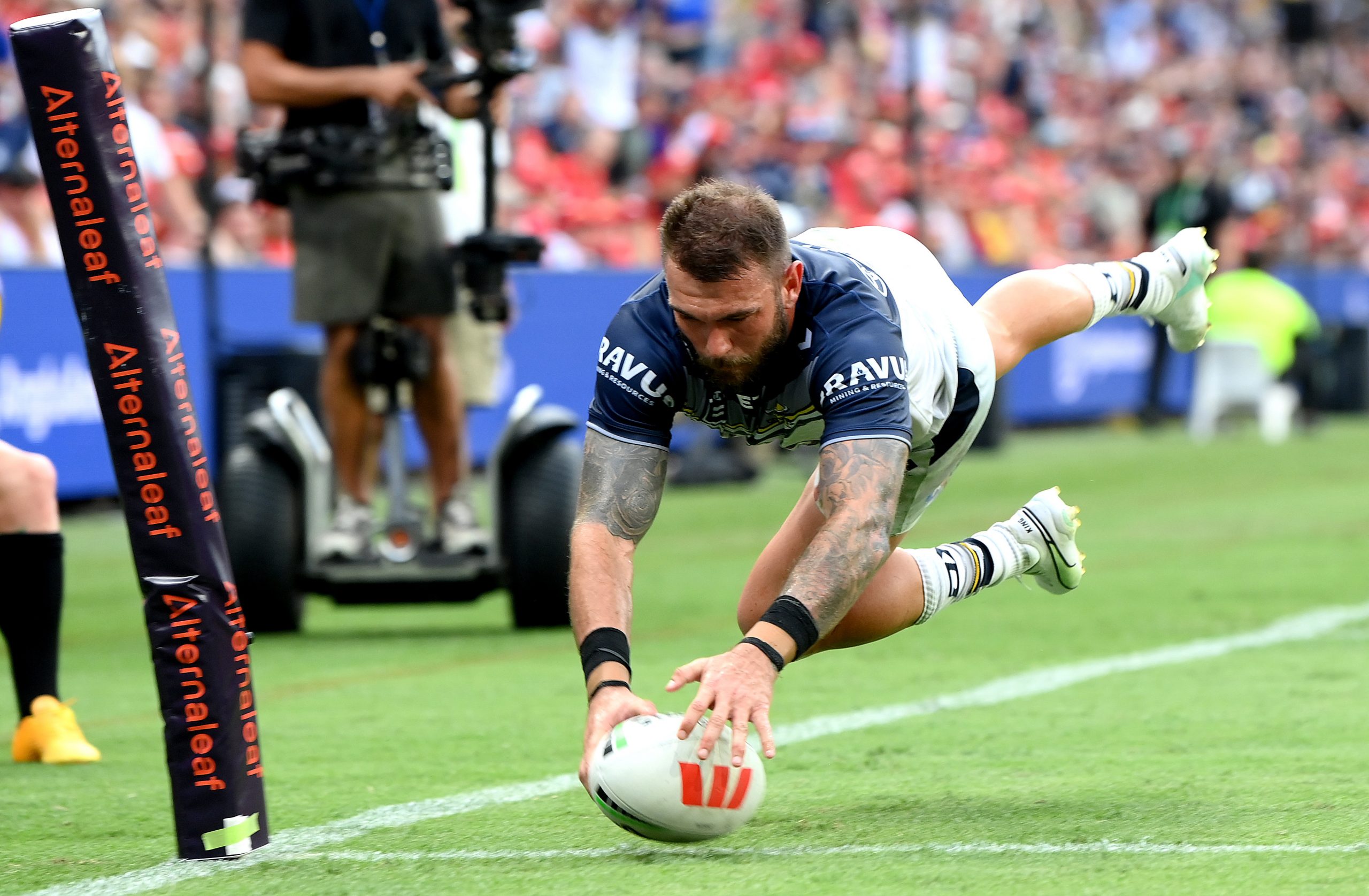 Kyle Feldt dives over for a try.