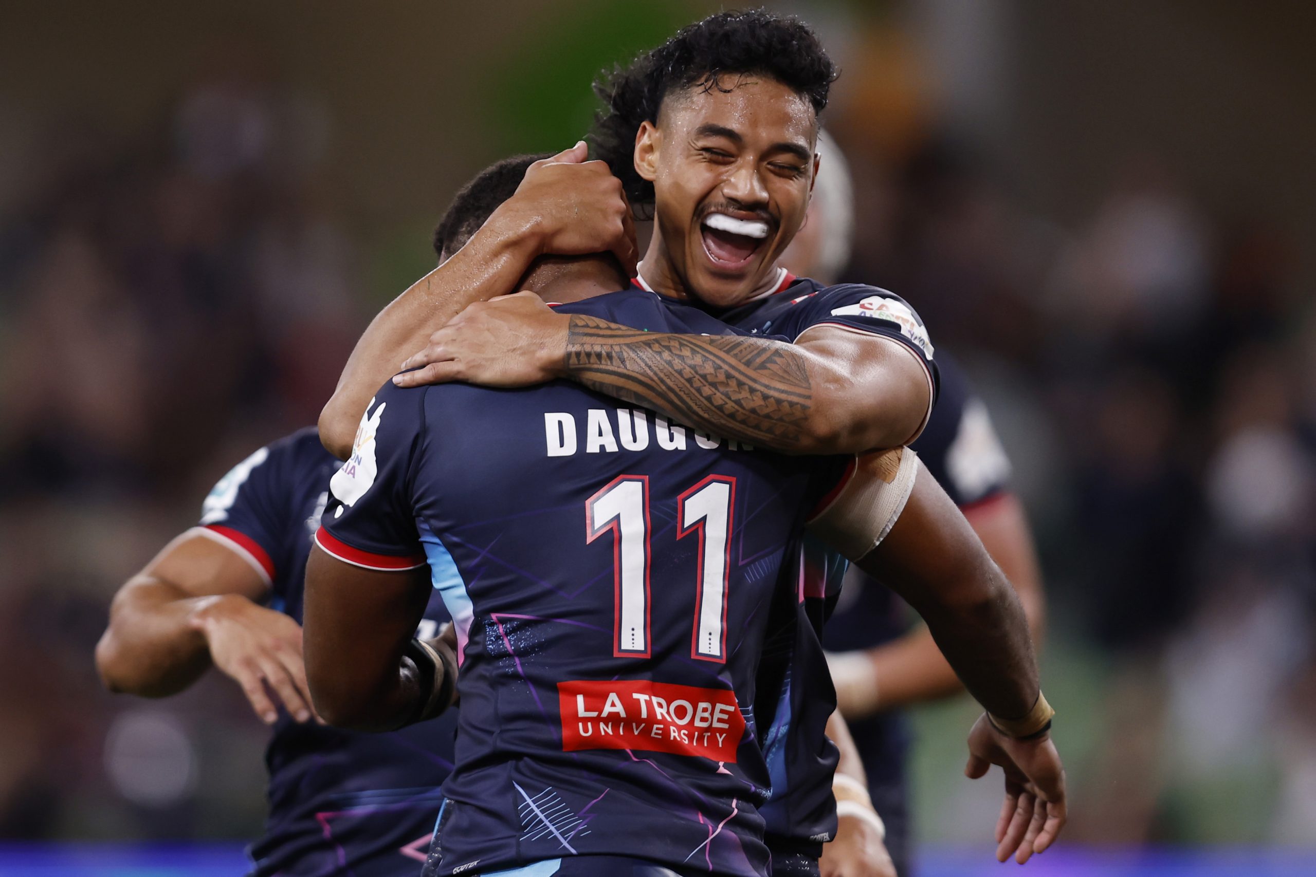 Filipo Daugunu of the Rebels celebrates a try during the round two Super Rugby Pacific match between Melbourne Rebels and Western Force at AAMI Park.