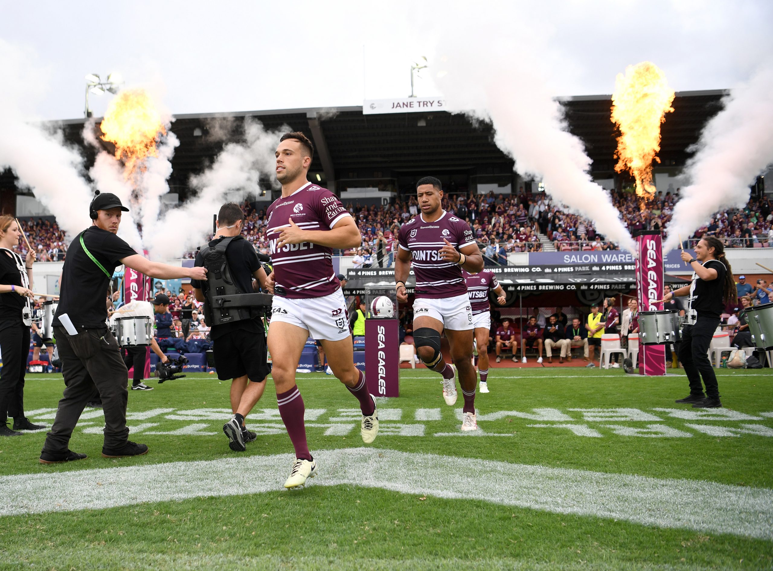 Luke Brooks runs onto the field for Manly against the Roosters in round two.