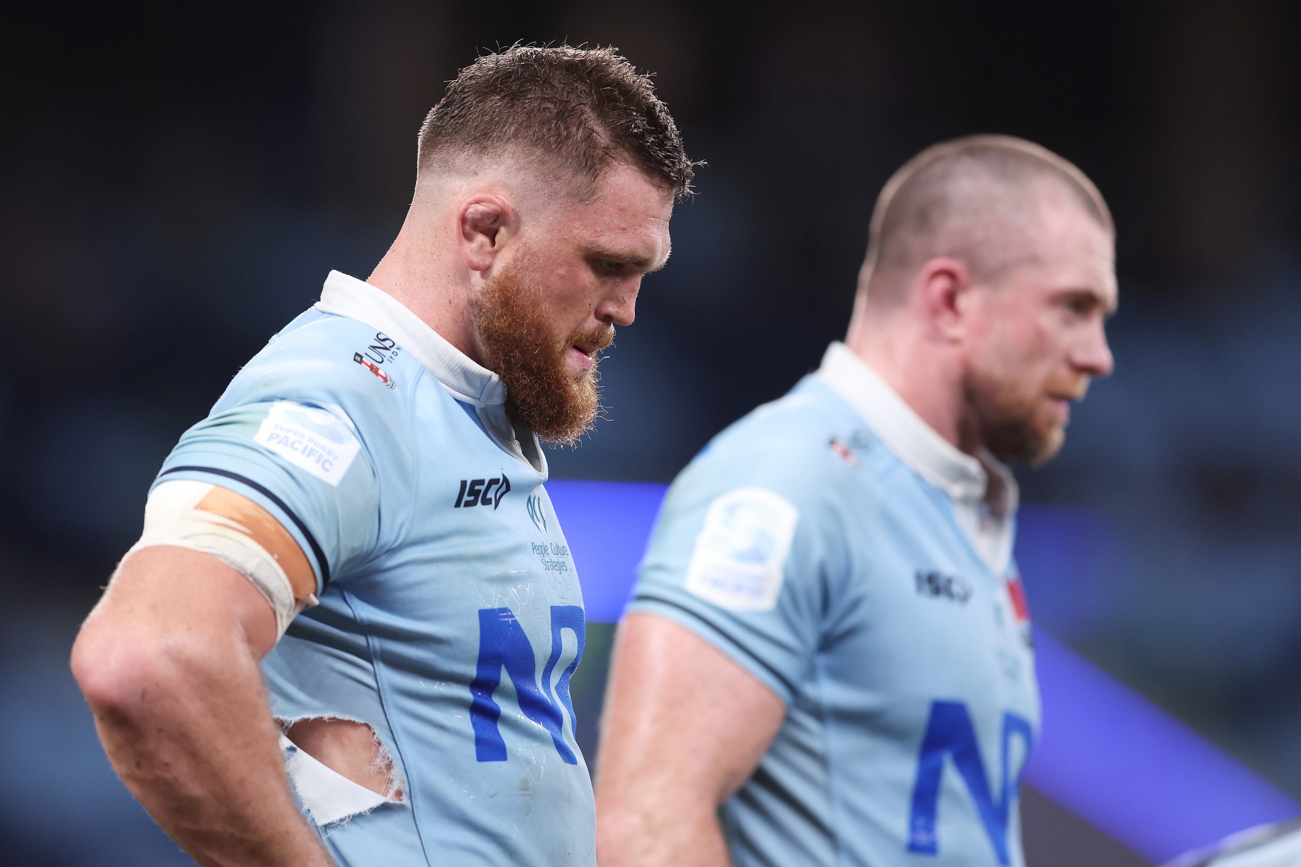 Lachlan Swinton of the Waratahs looks dejected after the final Rebels try during the round six Super Rugby Pacific match between NSW Waratahs and Melbourne Rebels.