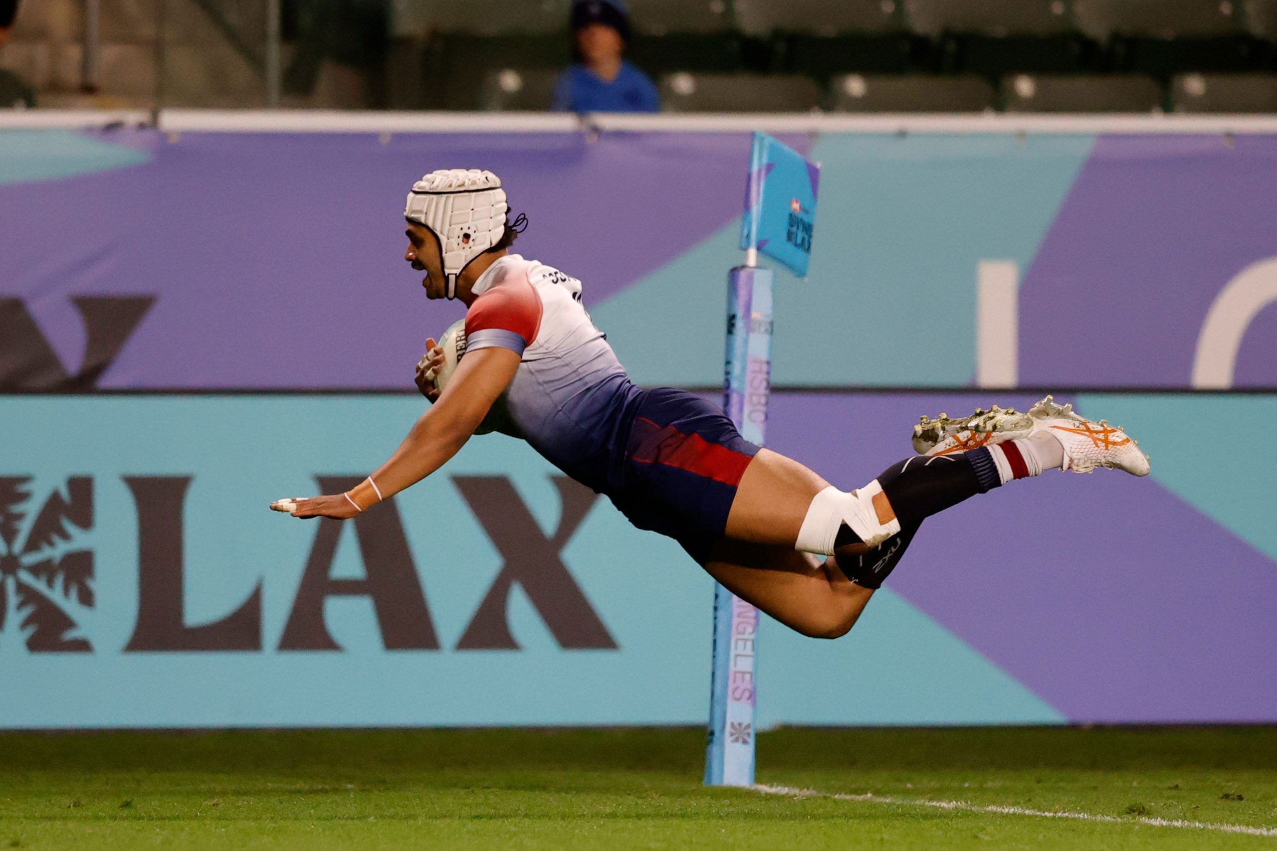 Great Britain's Femi Sofolarin dives in the match winning try against Australia in the cup quarter final.