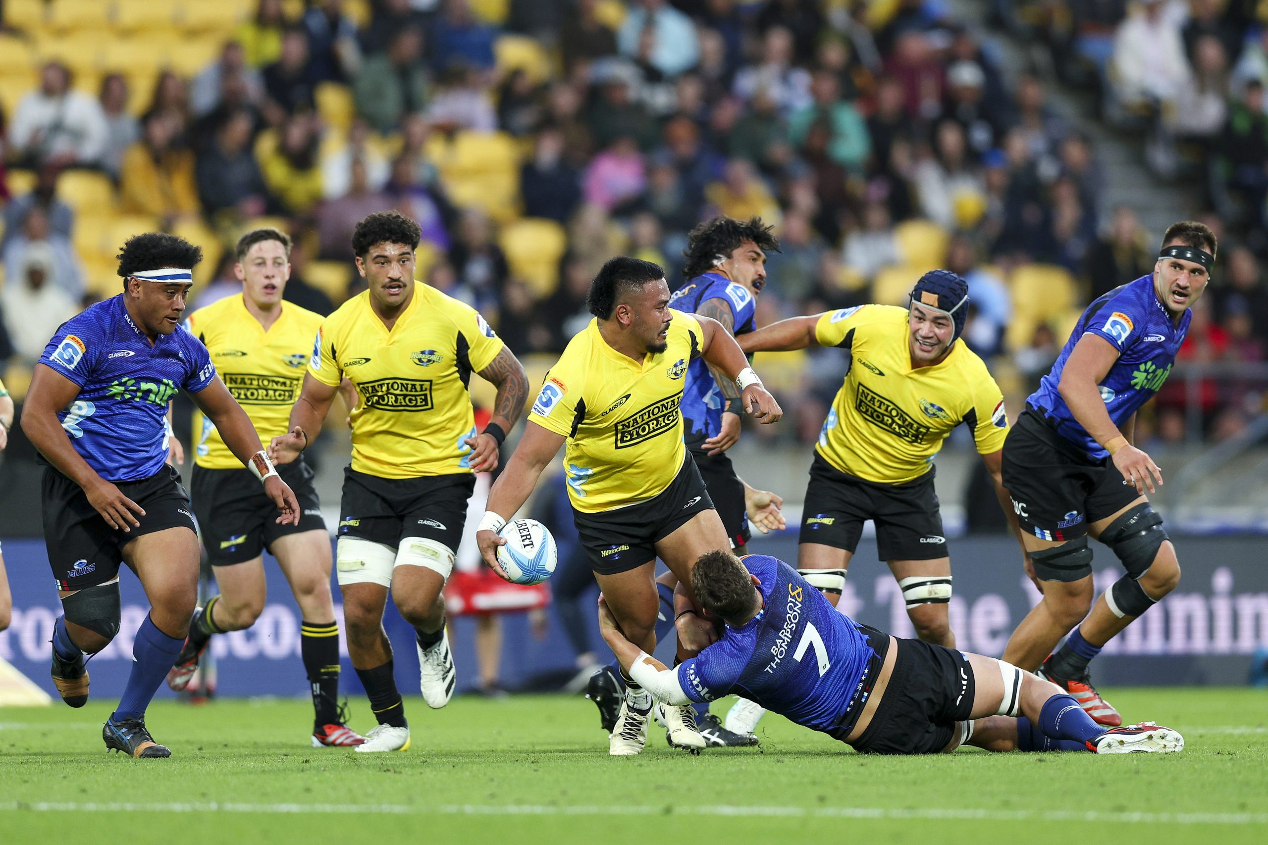 Asafo Aumua of the Hurricanes looks to pass.