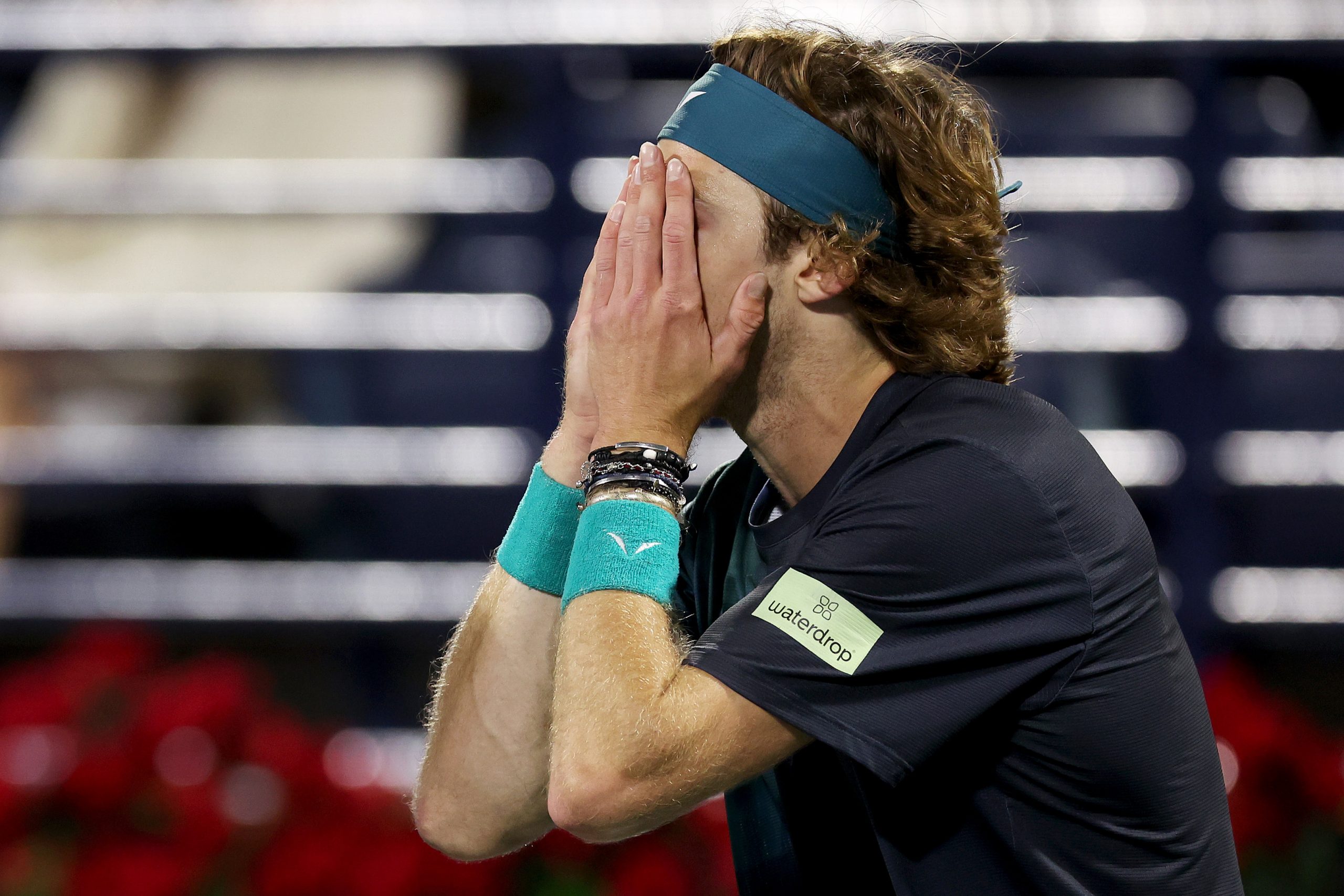 Andrey Rublev reacts to being dismissed by the court supervisor after shouting at a line judge while playing Alexander Bublik of Kazakhstan in their semifinal match during the Dubai Duty Free Tennis Championships at Dubai Duty Free Tennis Stadium on March 01, 2024 in Dubai, United Arab Emirates. (Photo by Christopher Pike/Getty Images)