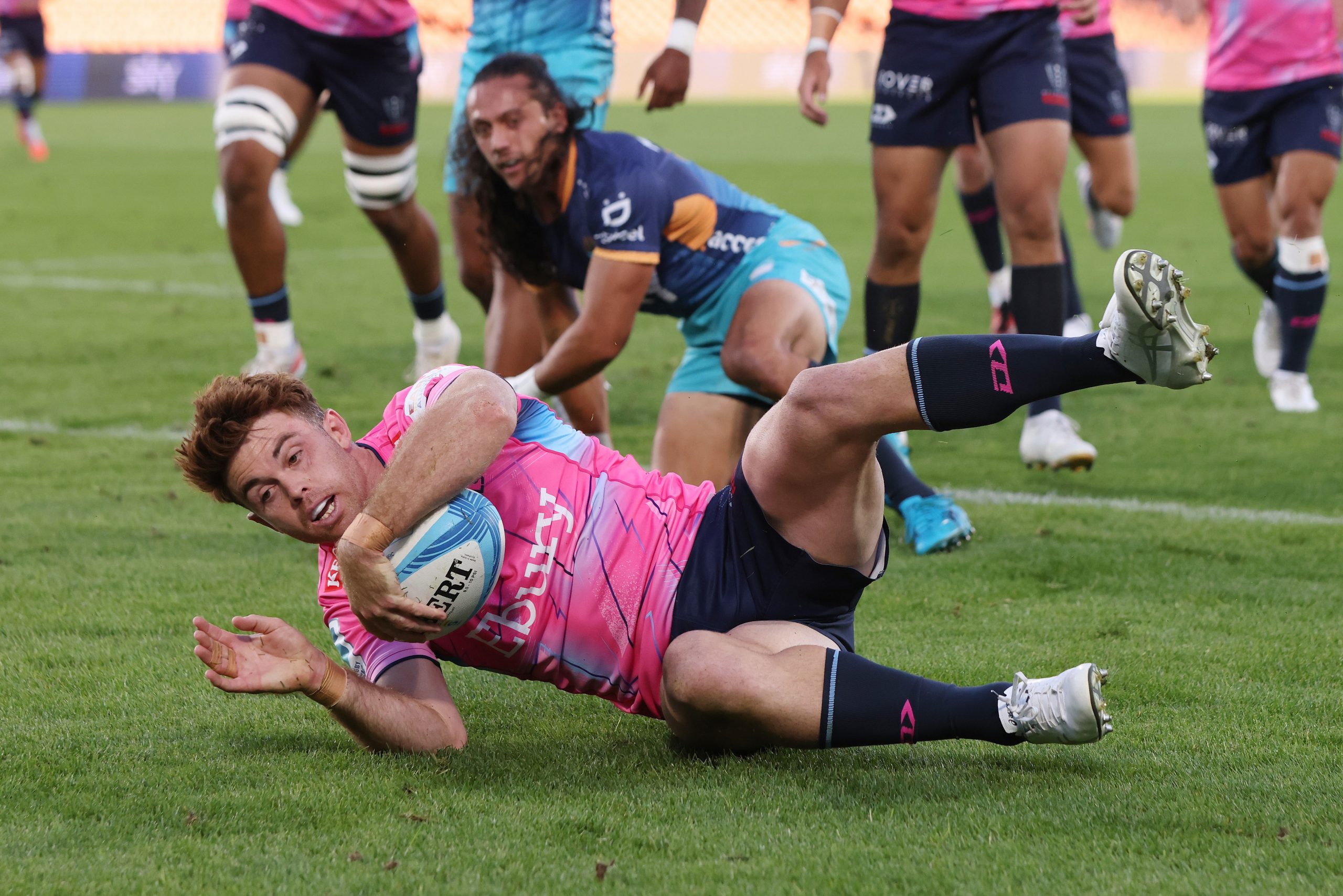 Andrew Kellaway of the Rebels dives over for a try.