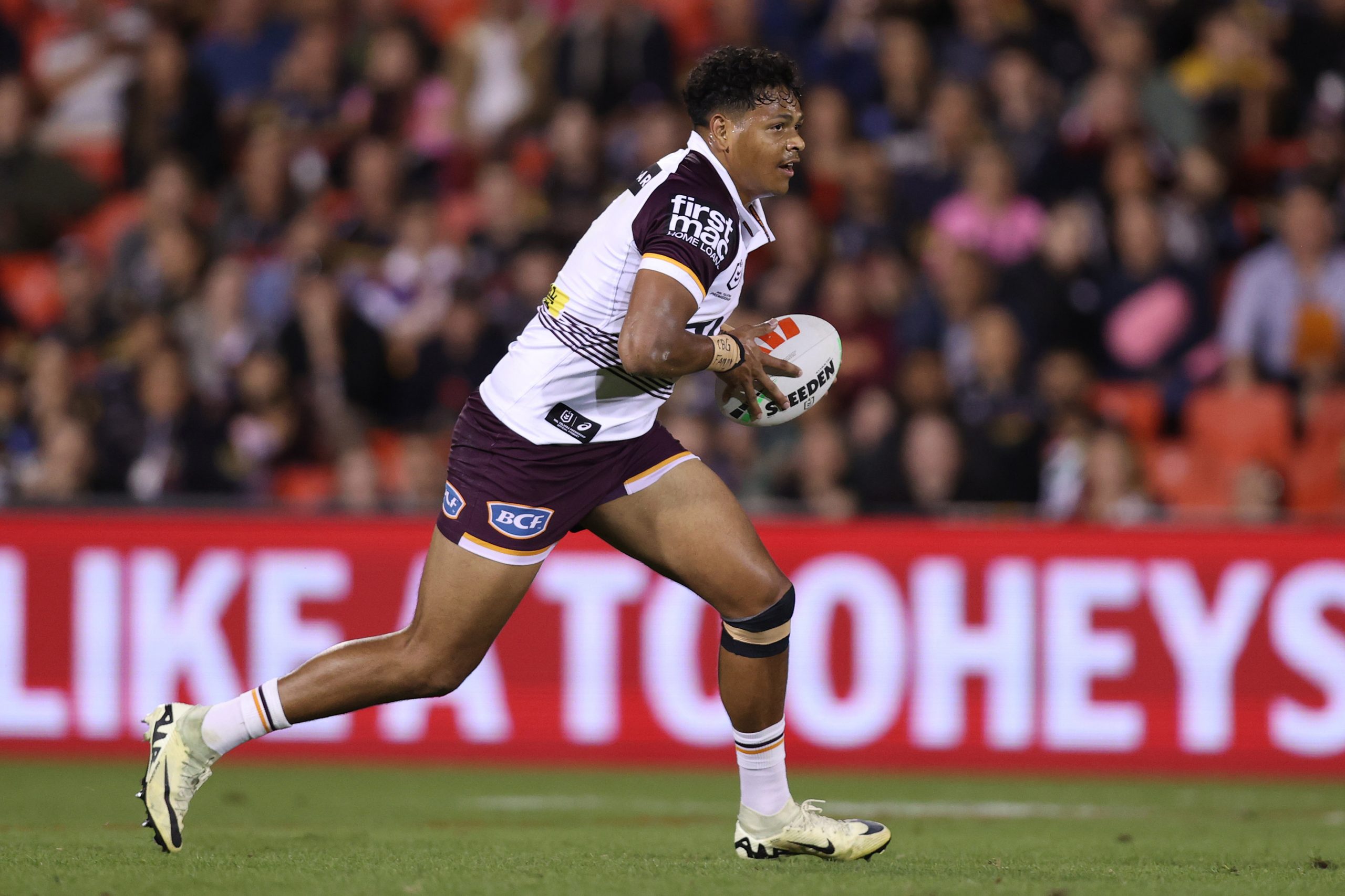Selwyn Cobbo of the Broncos runs the ball during the round three NRL match between Penrith Panthers and Brisbane Broncos at BlueBet Stadium on March 21, 2024 in Penrith, Australia. (Photo by Jason McCawley/Getty Images)