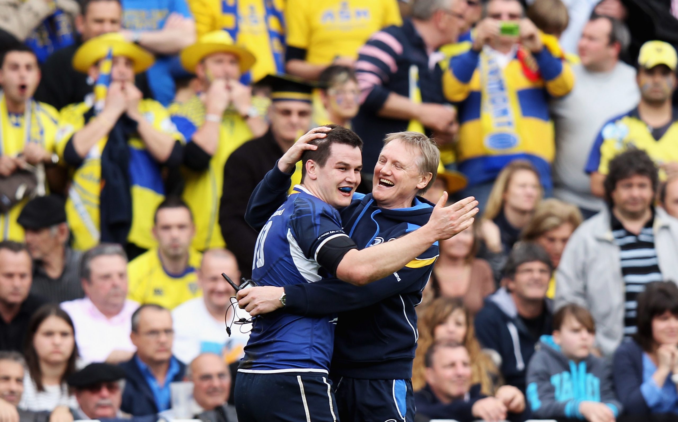 Johnny Sexton of Leinster celebrates with then-head coach Joe Schmidt during the Heineken Cup semi-final in 2012.
