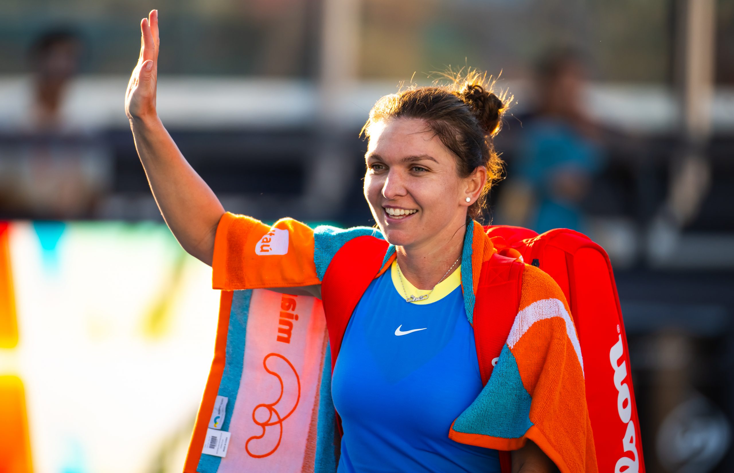 Simona Halep walks off the court after losing to Paula Badosa in the first round at the Miami Open.