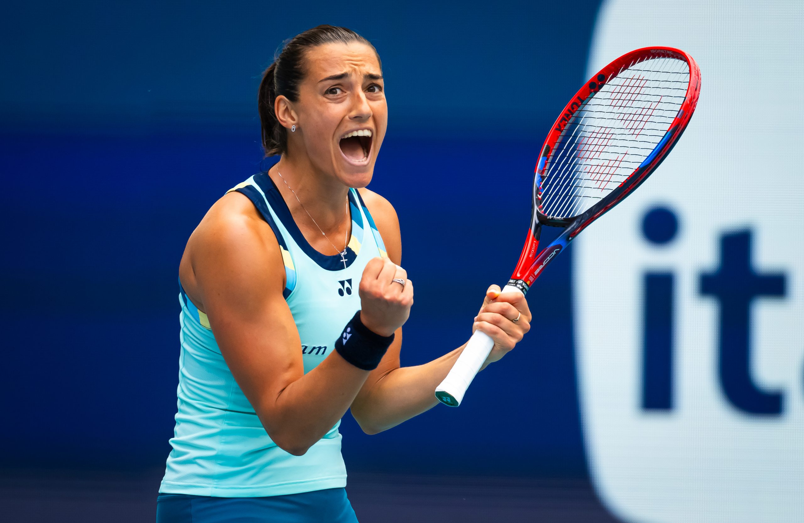 Caroline Garcia reacts to defeating Coco Gauff at the Miami Open.