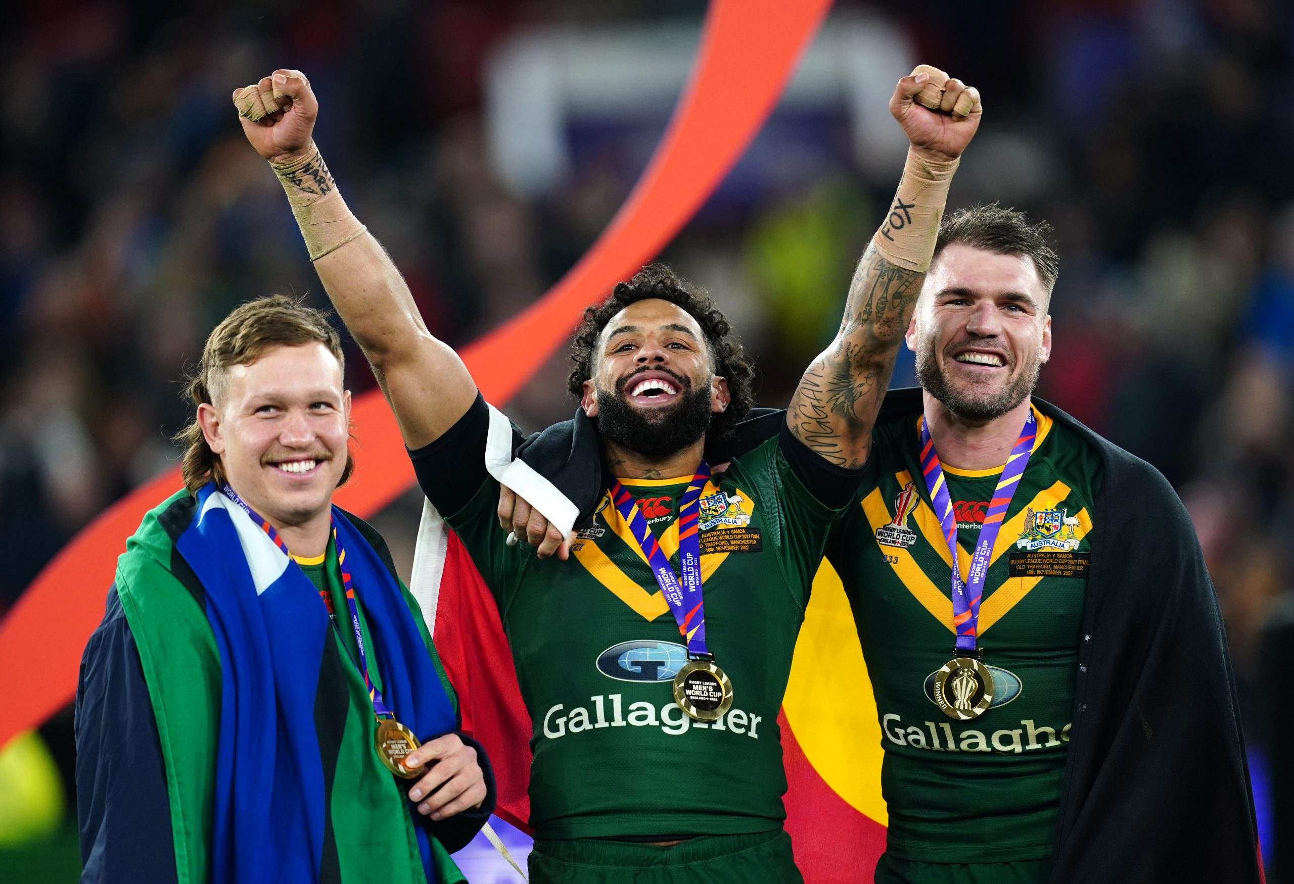 Australia's Reuben Cotter, Josh Addo-Carr and Angus Crichton celebrate following the Rugby League World Cup final at Old Trafford, Manchester. Picture date: Saturday November 19, 2022. (Photo by David Davies/PA Images via Getty Images)