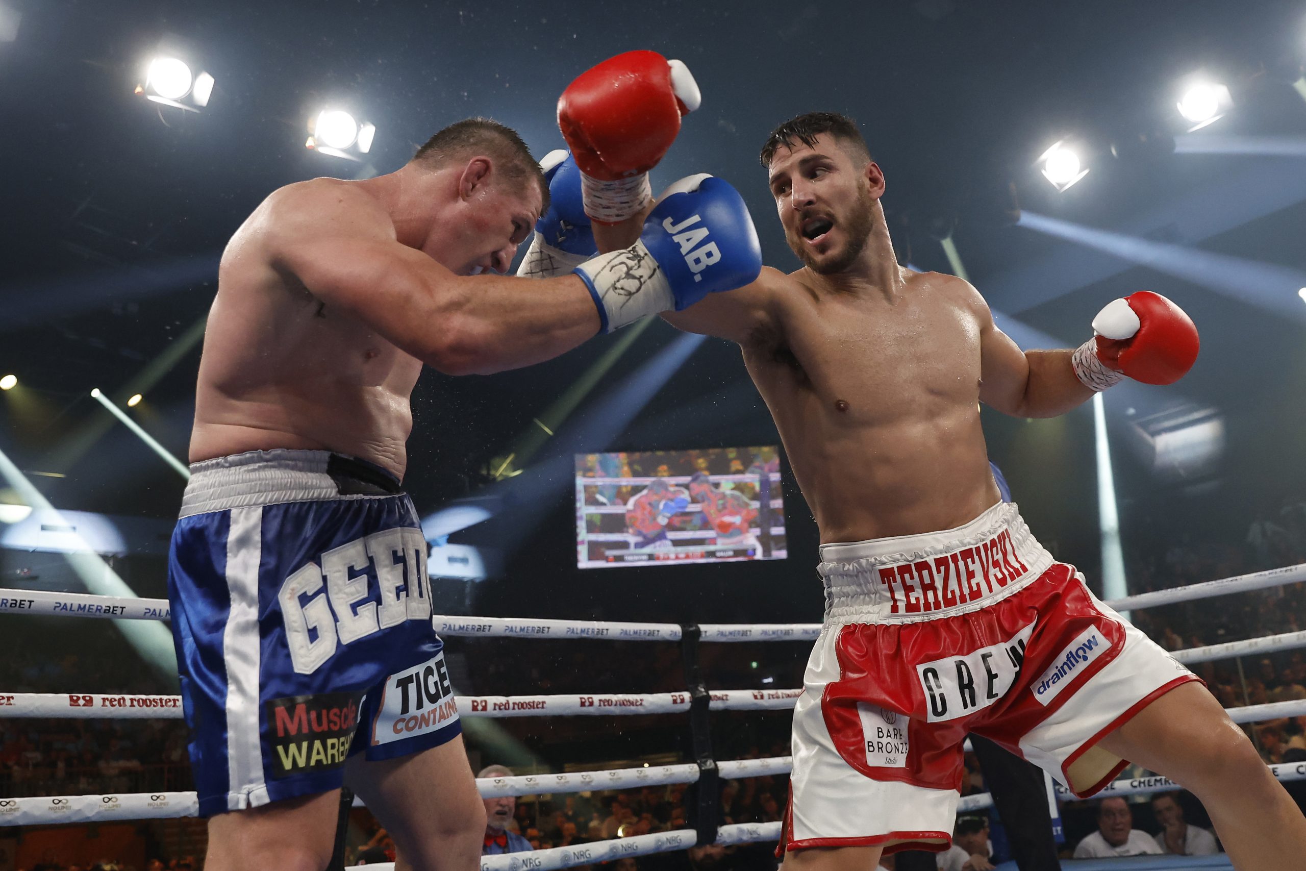Kris Terzievski throws a punch during the Australasian heavyweight title bout against Paul Gallen as part of the King of the Castle Fight Night at Newcastle Entertainment Centre in 2022.