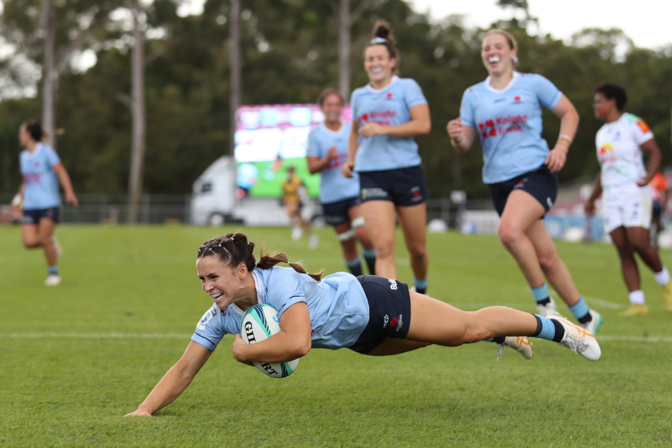 Desiree Miller of the Waratahs scores her third try during the Super Rugby Women's grand final match.