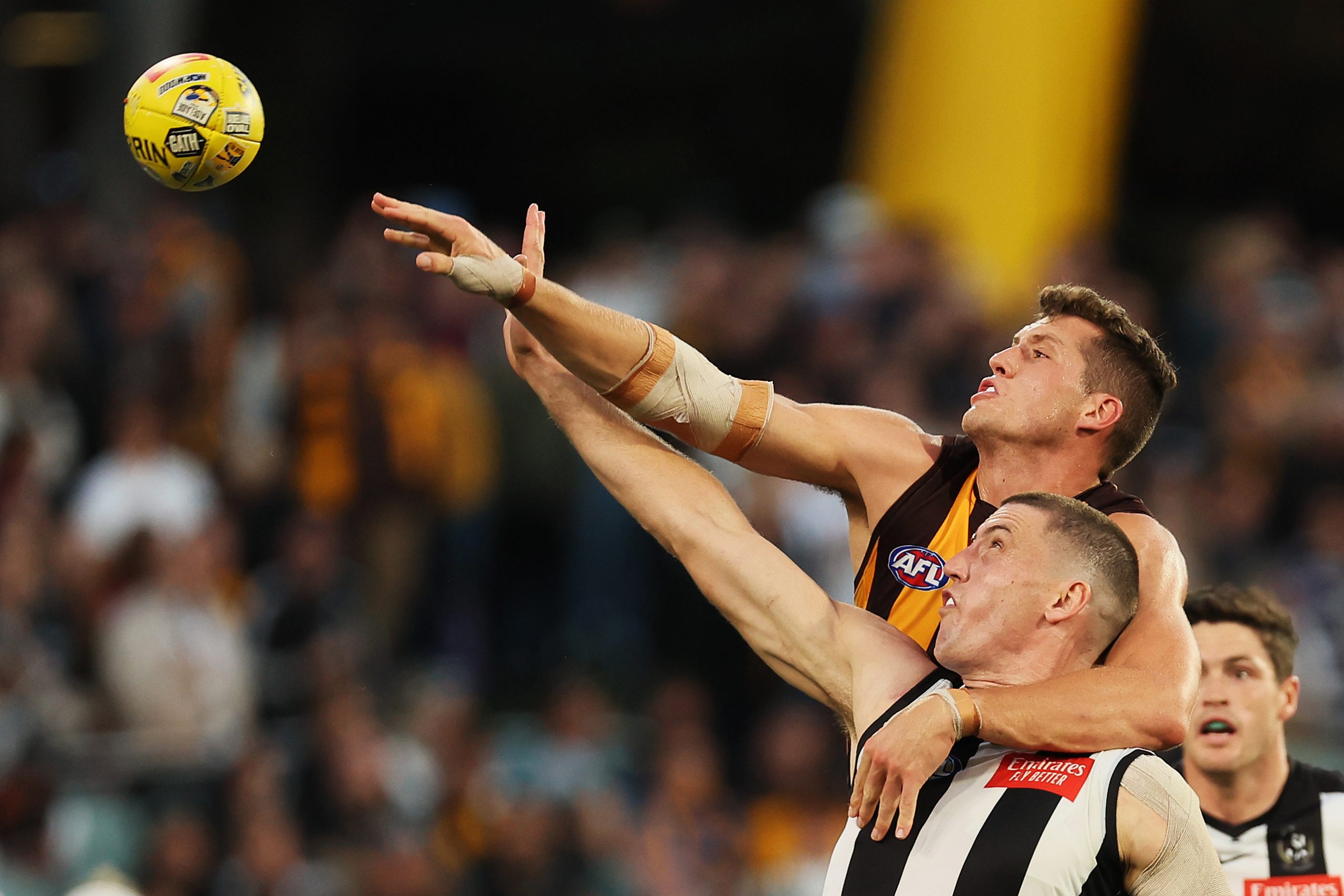 Darcy Cameron competes with Lloyd Meek.