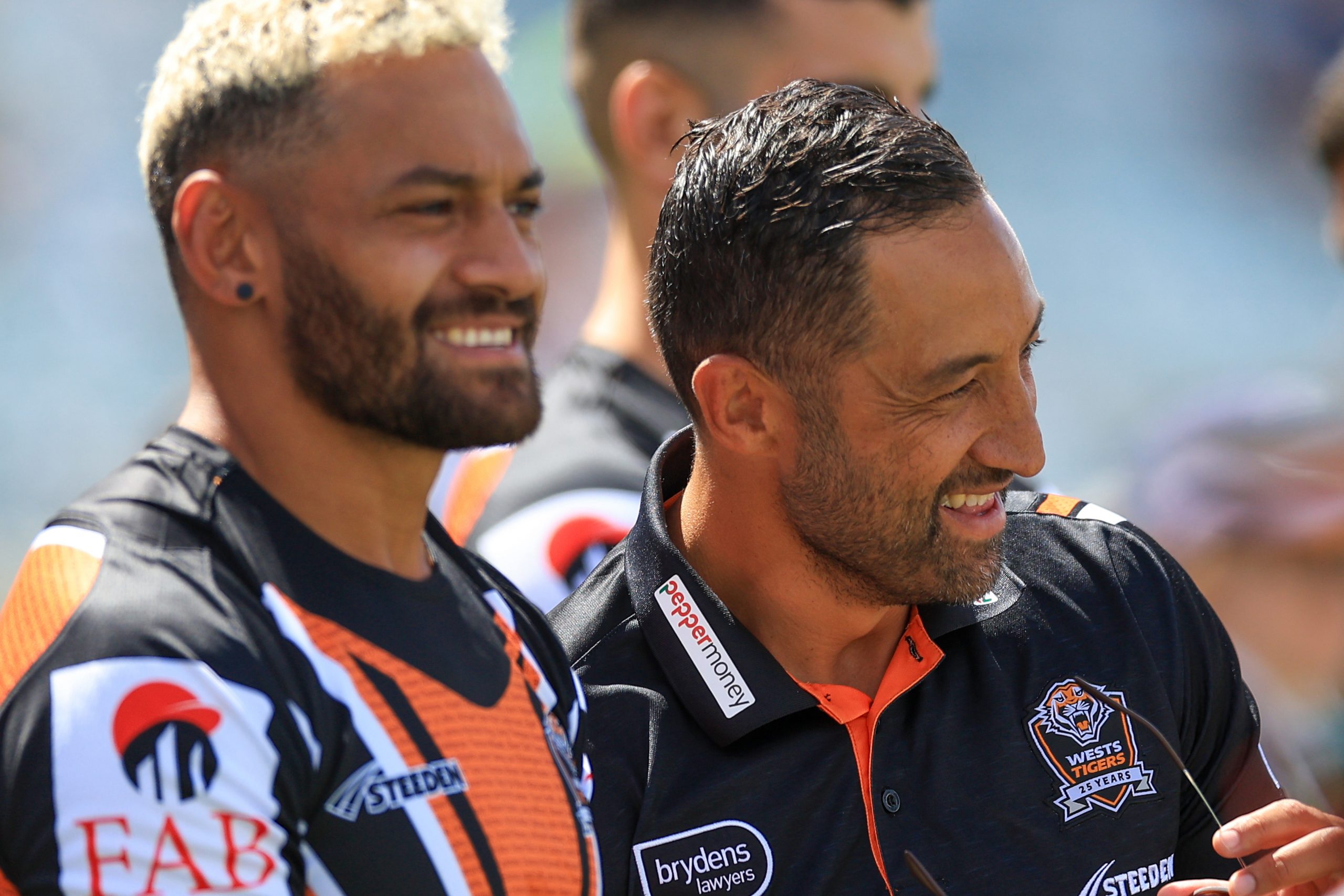 Tigers hooker Api Koroisau with head coach Benji Marshall.