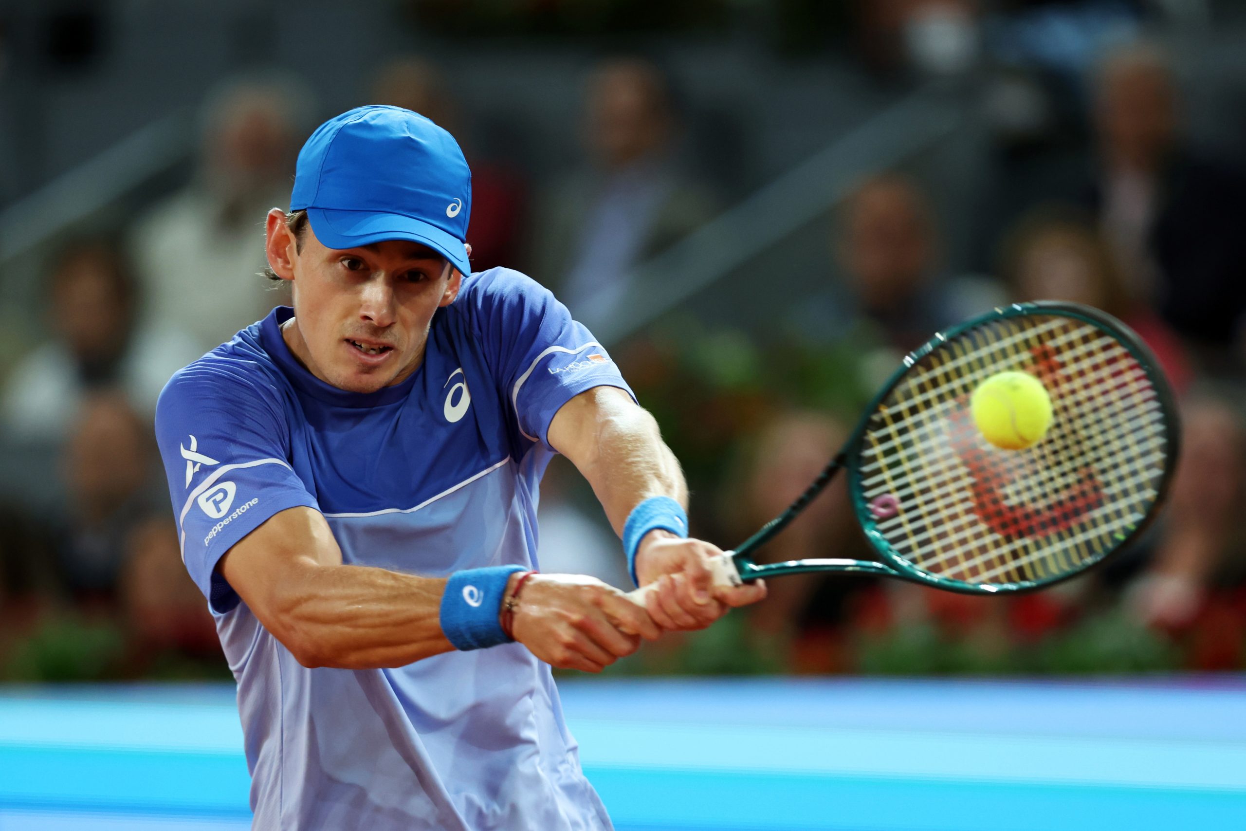 Alex de Minaur of Australia plays a backhand against Rafael Nadal of Spain in the Men's Singles Round of 64 match during Day Five of the Mutua Madrid Open at La Caja Magica on April 27, 2024 in Madrid, Spain. (Photo by Clive Brunskill/Getty Images)
