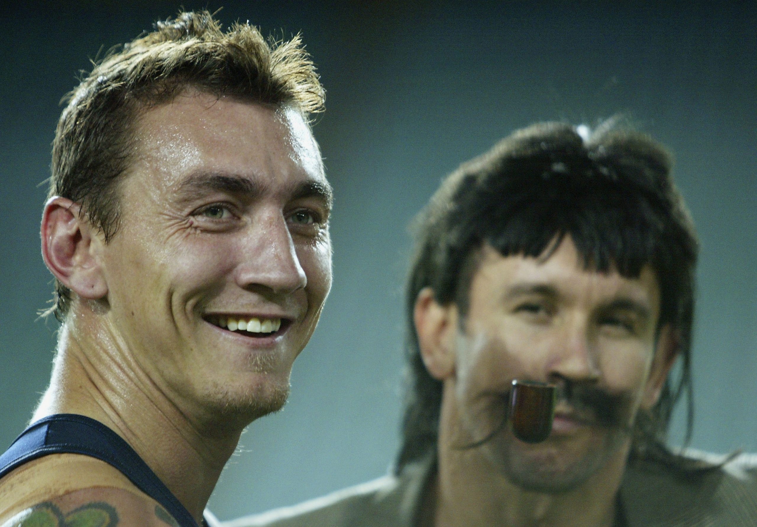 Mat Rogers of the Waratahs and television personality Reg Reagan in 2005.
