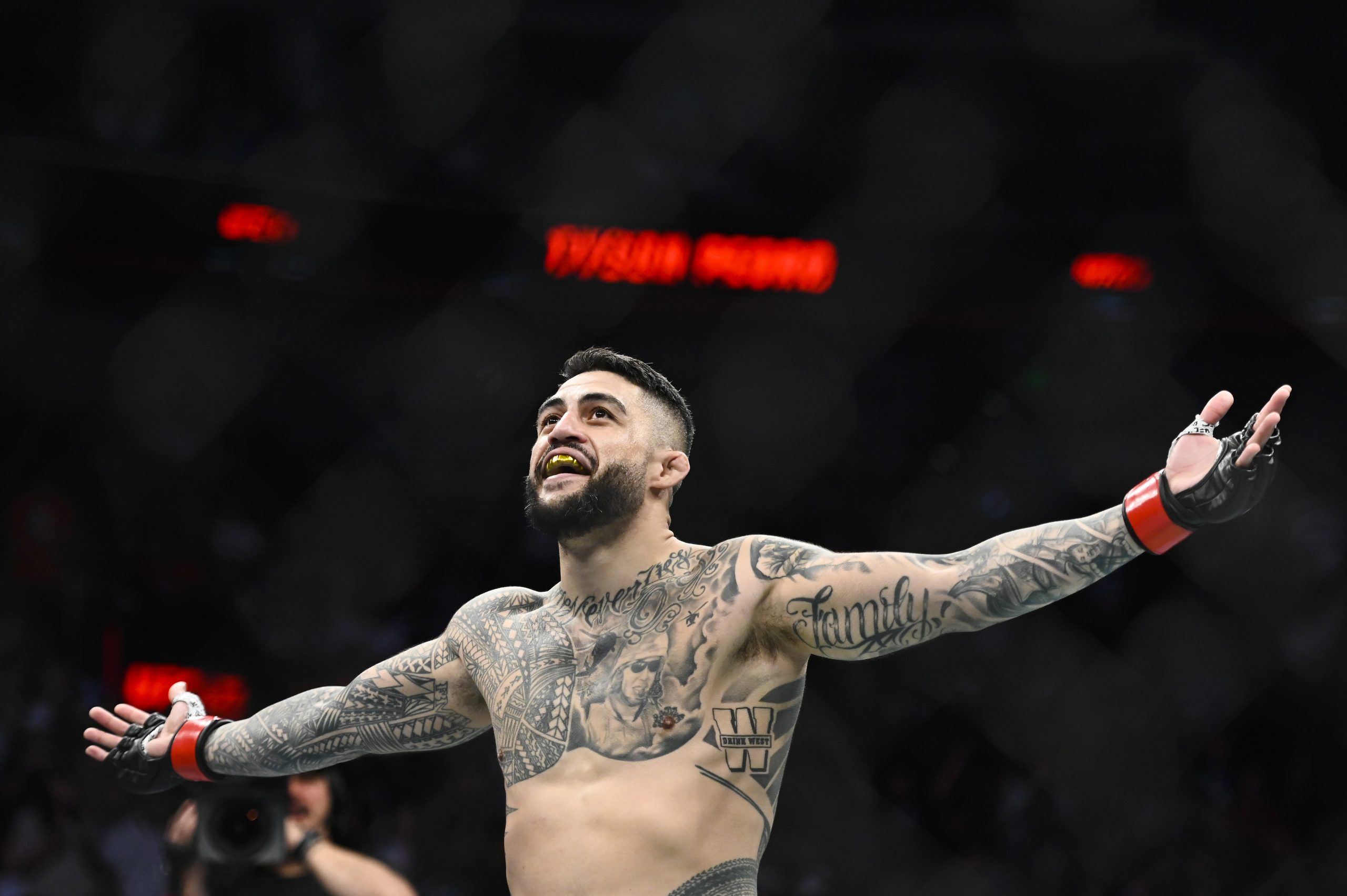 Tyson Pedro of Australia celebrates after defeating Harry Hunsucker of the United States in a light heavyweight bout during UFC 278.
