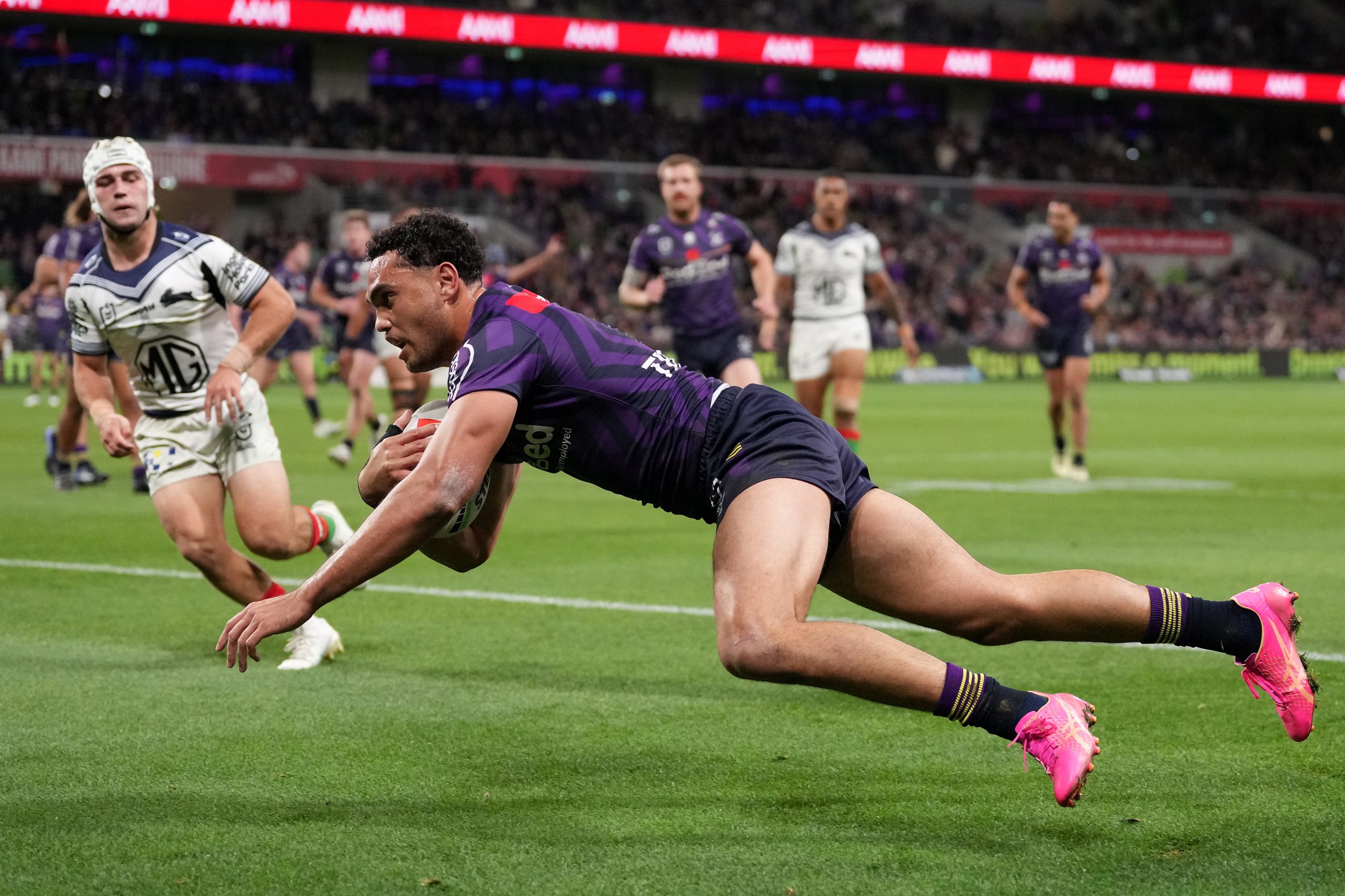 Xavier Coates of the Storm scores his second tryduring the round eight NRL match between Melbourne Storm and South Sydney Rabbitohs at AAMI Park on April 25, 2024, in Melbourne, Australia. (Photo by Daniel Pockett/Getty Images)