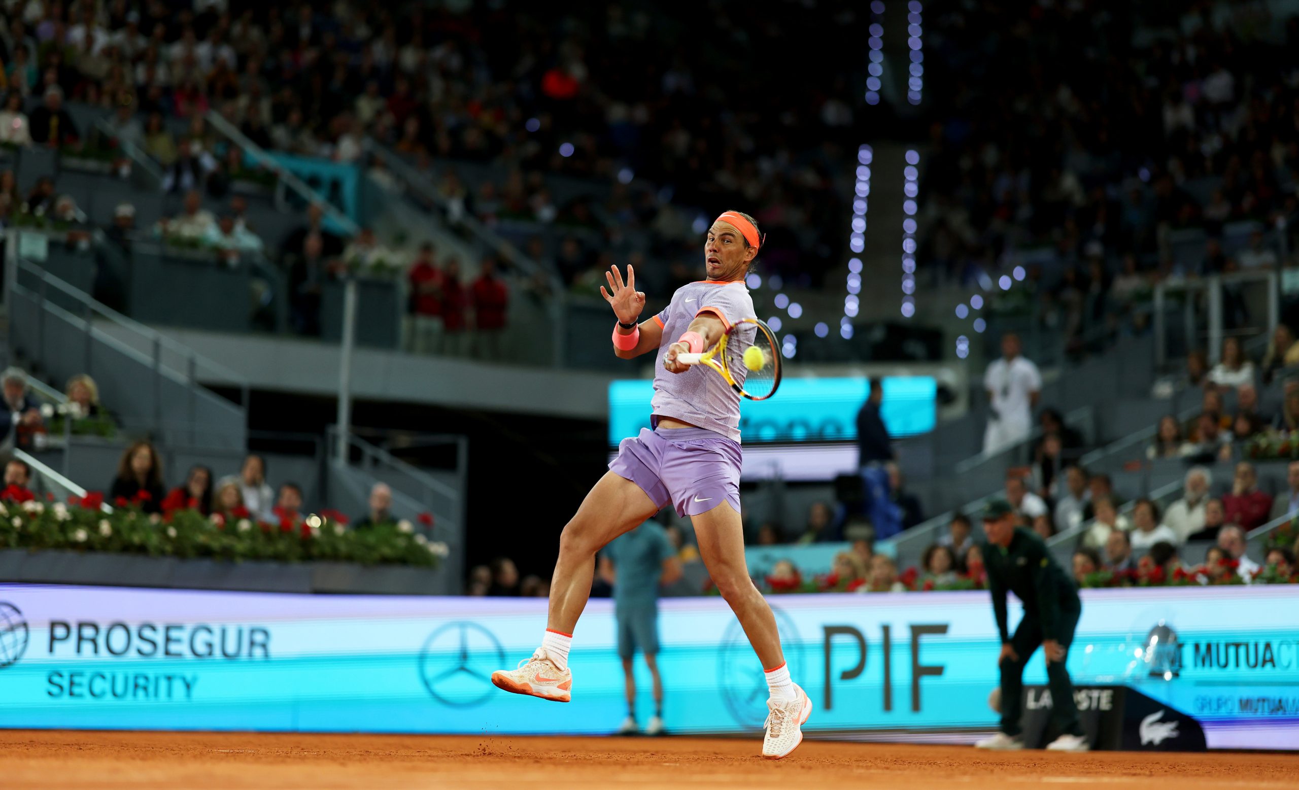 Rafael Nadal of Spain plays a forehand against Alex de Minaur of Australia in the Men's Singles Round of 64 match during Day Five of the Mutua Madrid Open at La Caja Magica on April 27, 2024 in Madrid, Spain. (Photo by Clive Brunskill/Getty Images)