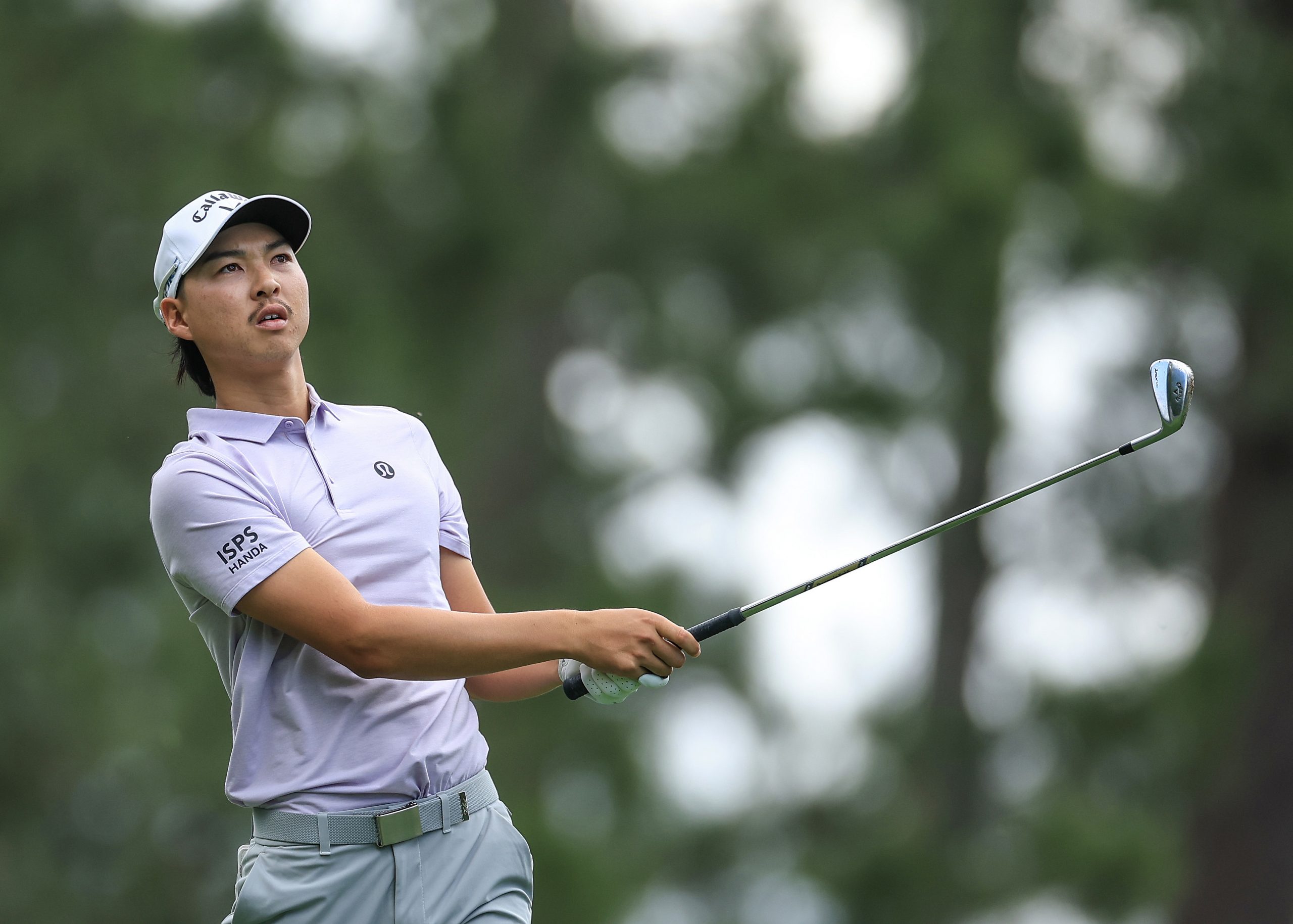 Min Woo Lee plays his tee shot on the fourth hole during the first round of the 2024 Masters Tournament. (Photo by David Cannon/Getty Images)