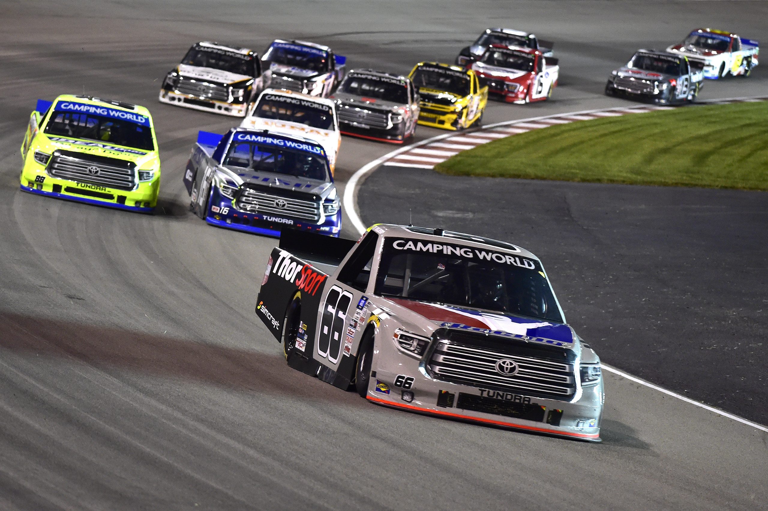 Cameron Waters will drive a ThorSport Racing Ford F-150 (pictured leadng) in the NASCAR Truck Series at Martinsville Speedway.