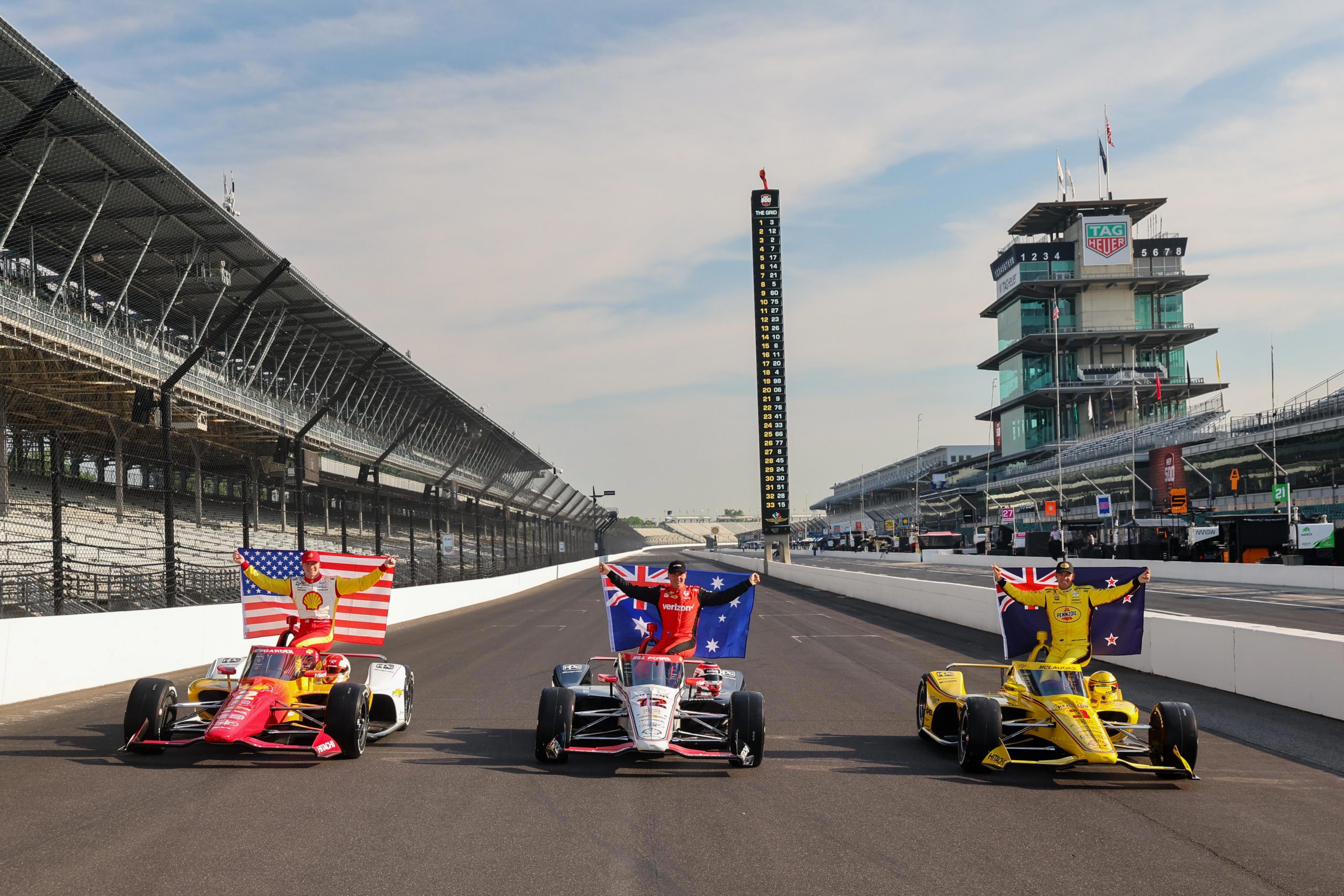 (From left) Team Penske stablemates Josef Newgarden, Will Power, and Scott McLaughlin pose for the customary front-row photo.