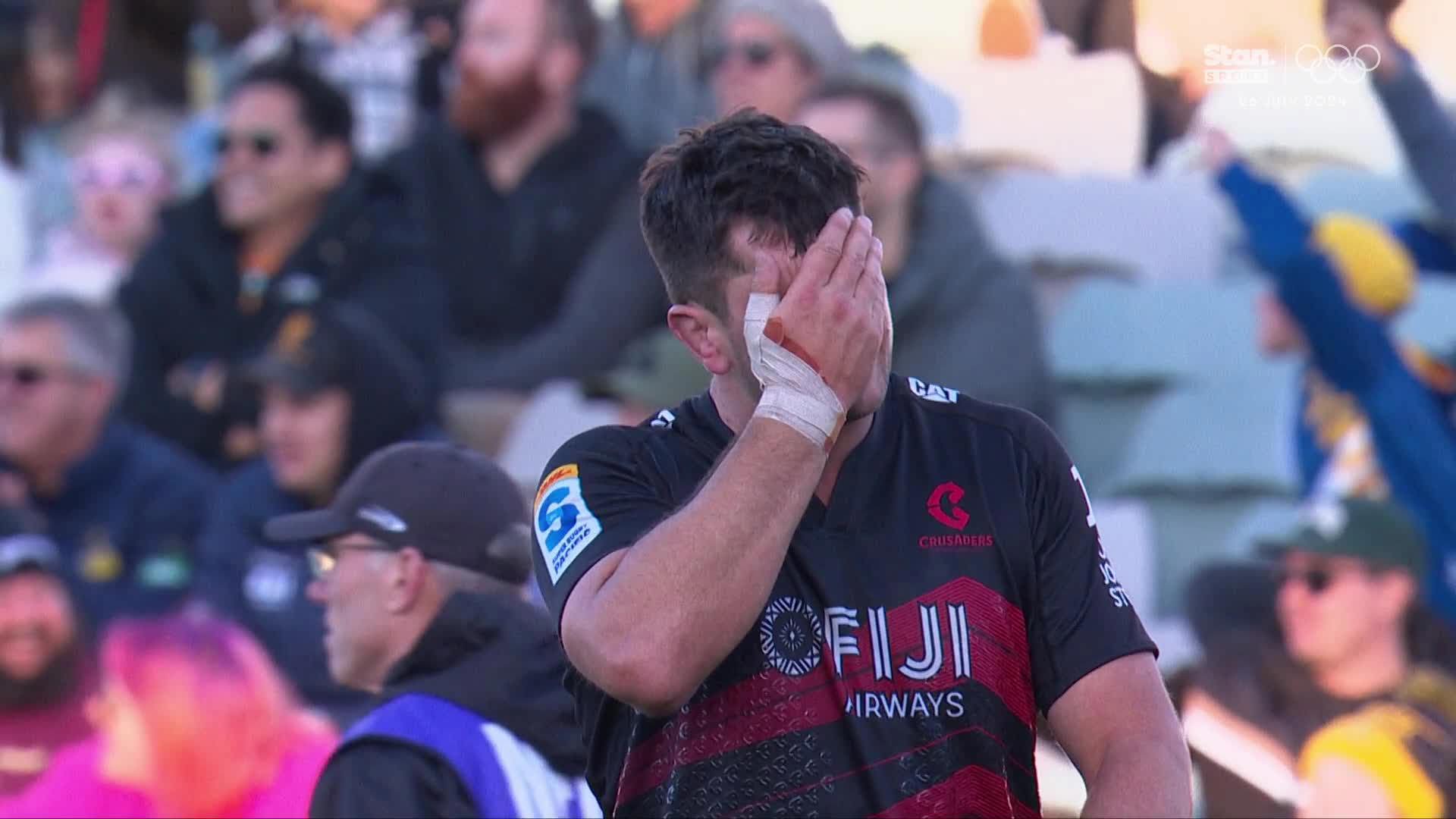 Crusaders player Quinten Strange reacts to conceding a penalty try on full-time against the Brumbies.