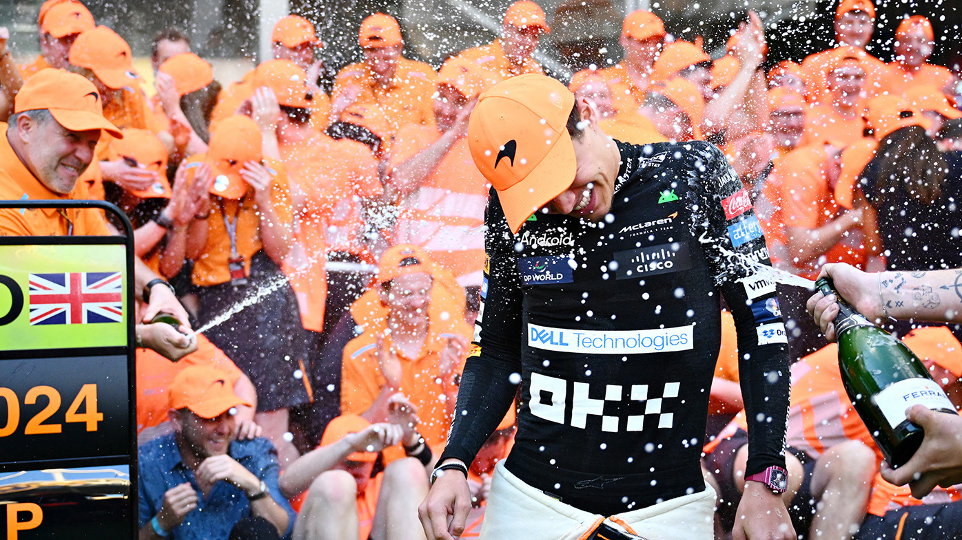 Race winner Lando Norris of Great Britain and McLaren celebrates victory with his team after the F1 Grand Prix of Miami at Miami International Autodrome on May 05, 2024 in Miami, Florida. (Photo by Clive Mason/Getty Images)