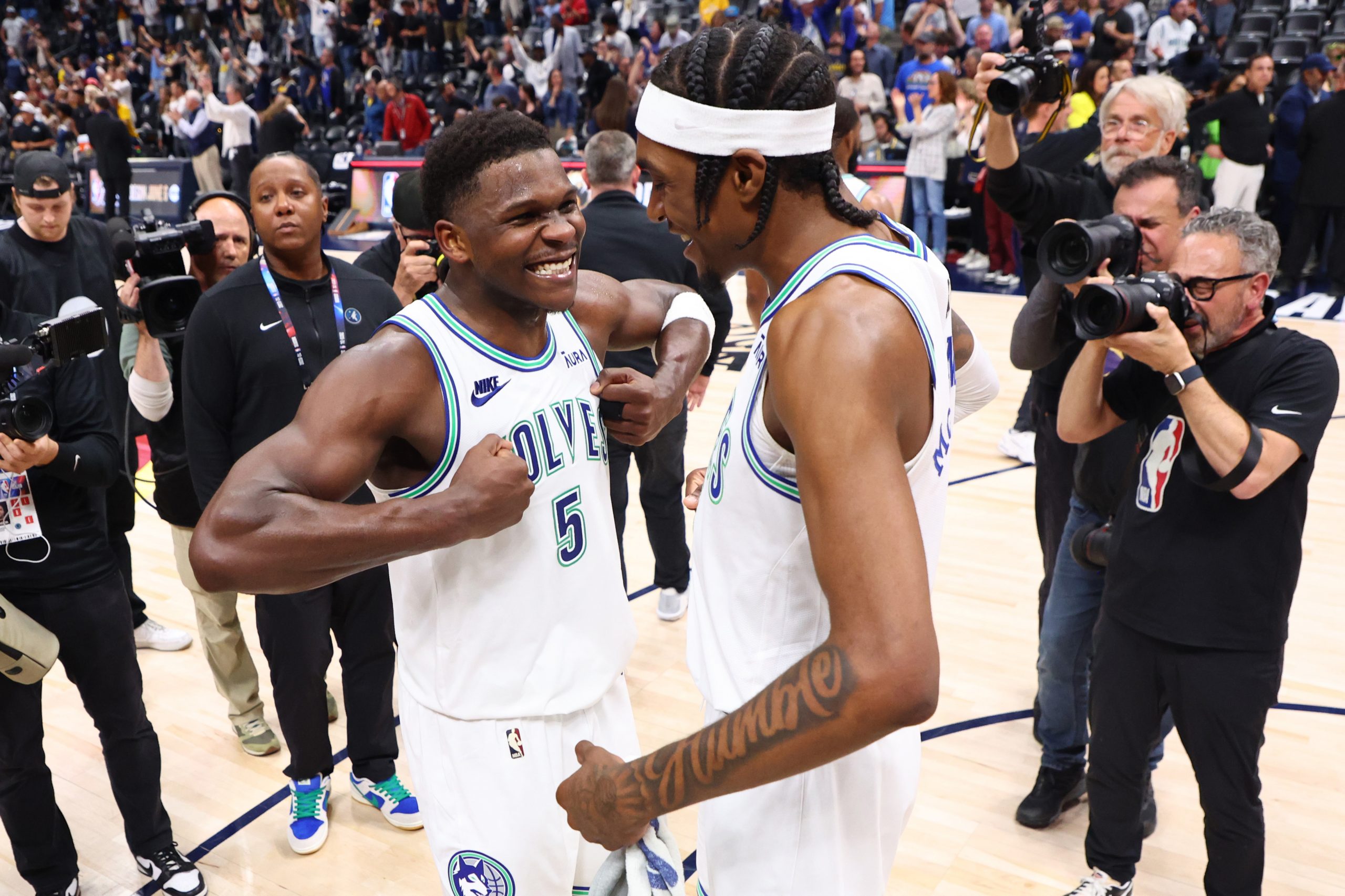 Anthony Edwards and Jaden McDaniels of the Minnesota Timberwolves celebrate.