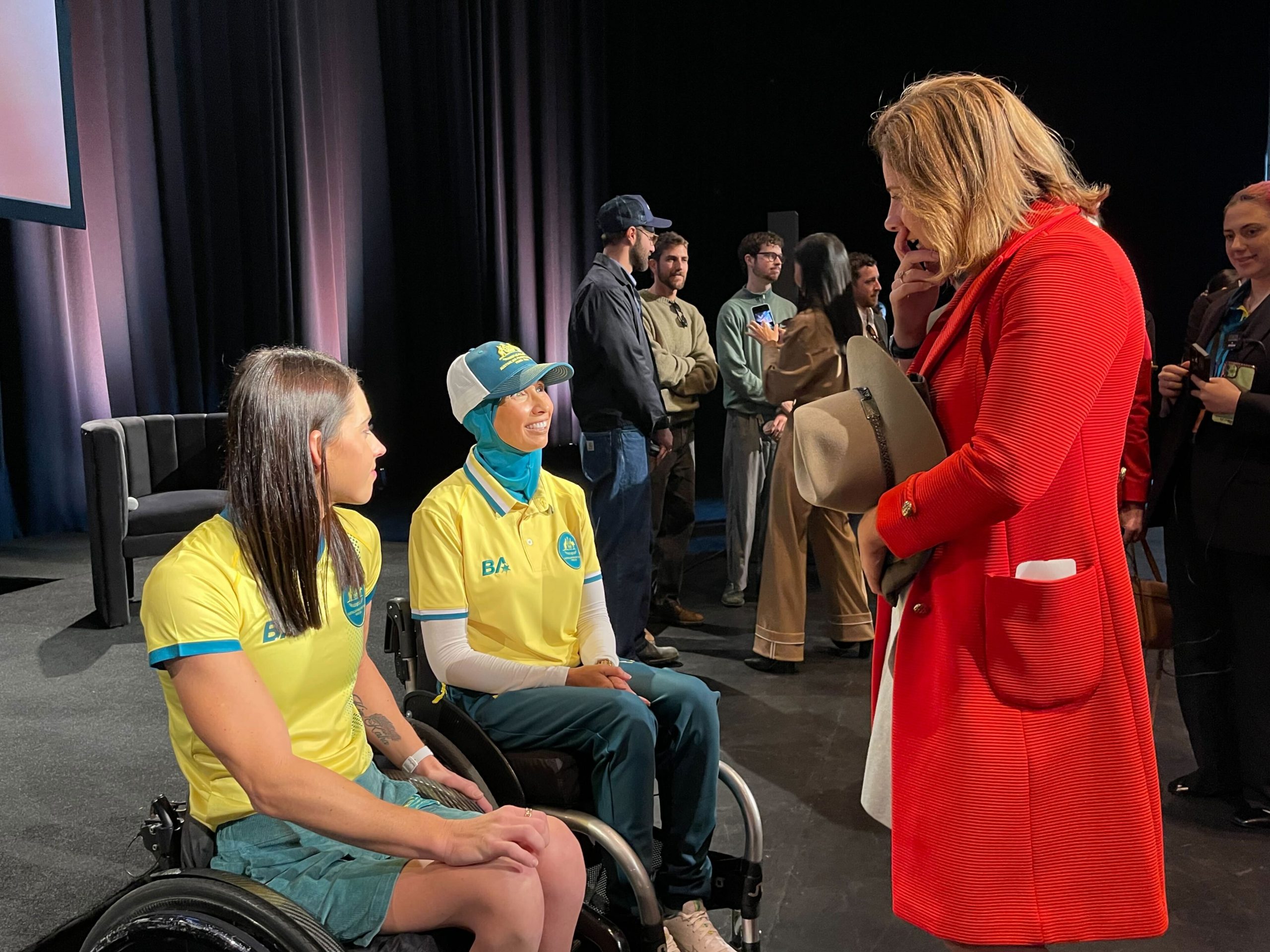 Federal Minister for Sport Anika Wells speaks with Australian Paralympic team athletes.