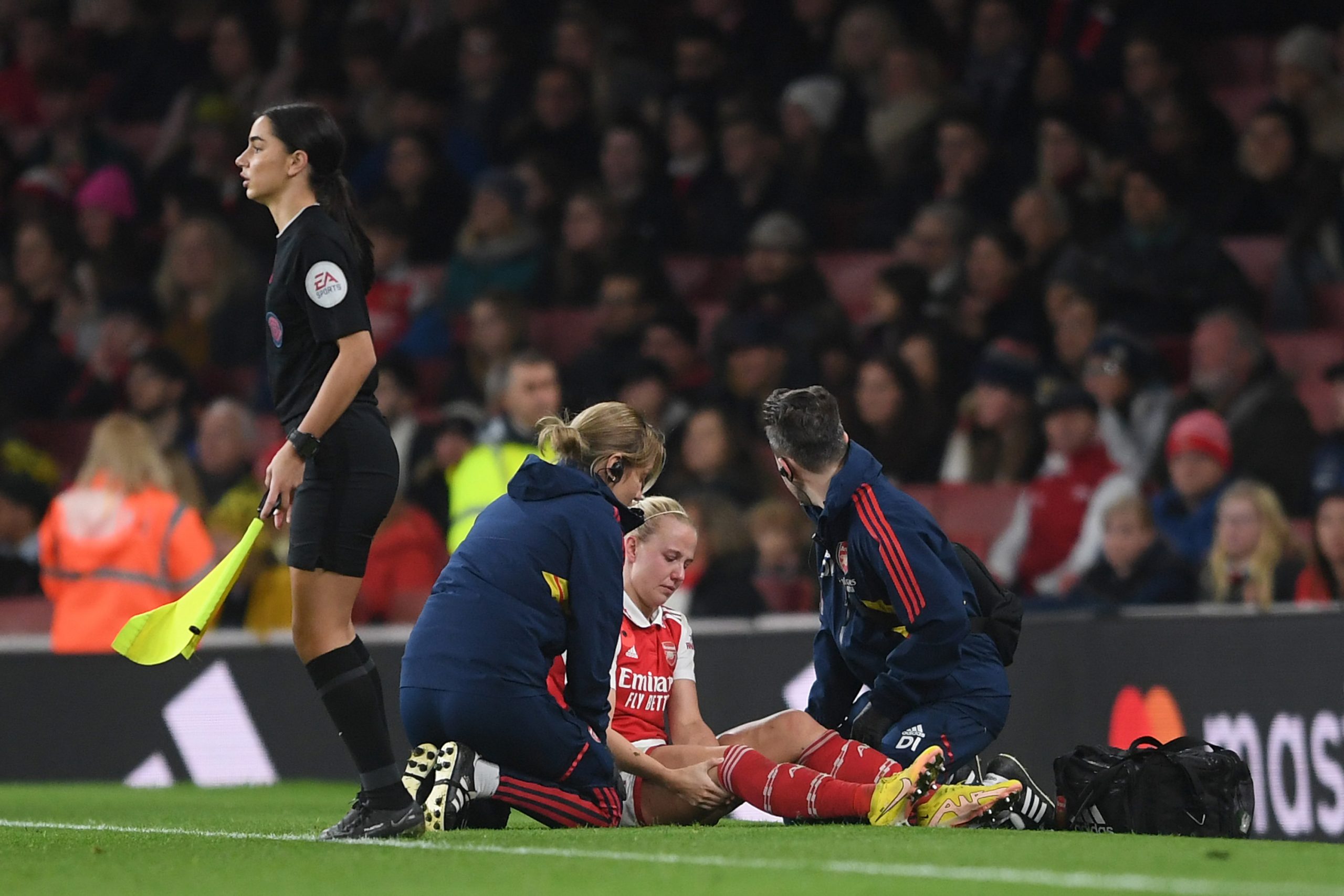 Beth Mead of Arsenal receives medical treatment during the FA Women's Super League match between Arsenal and Manchester United in 2022 after blowing her ACL out. 