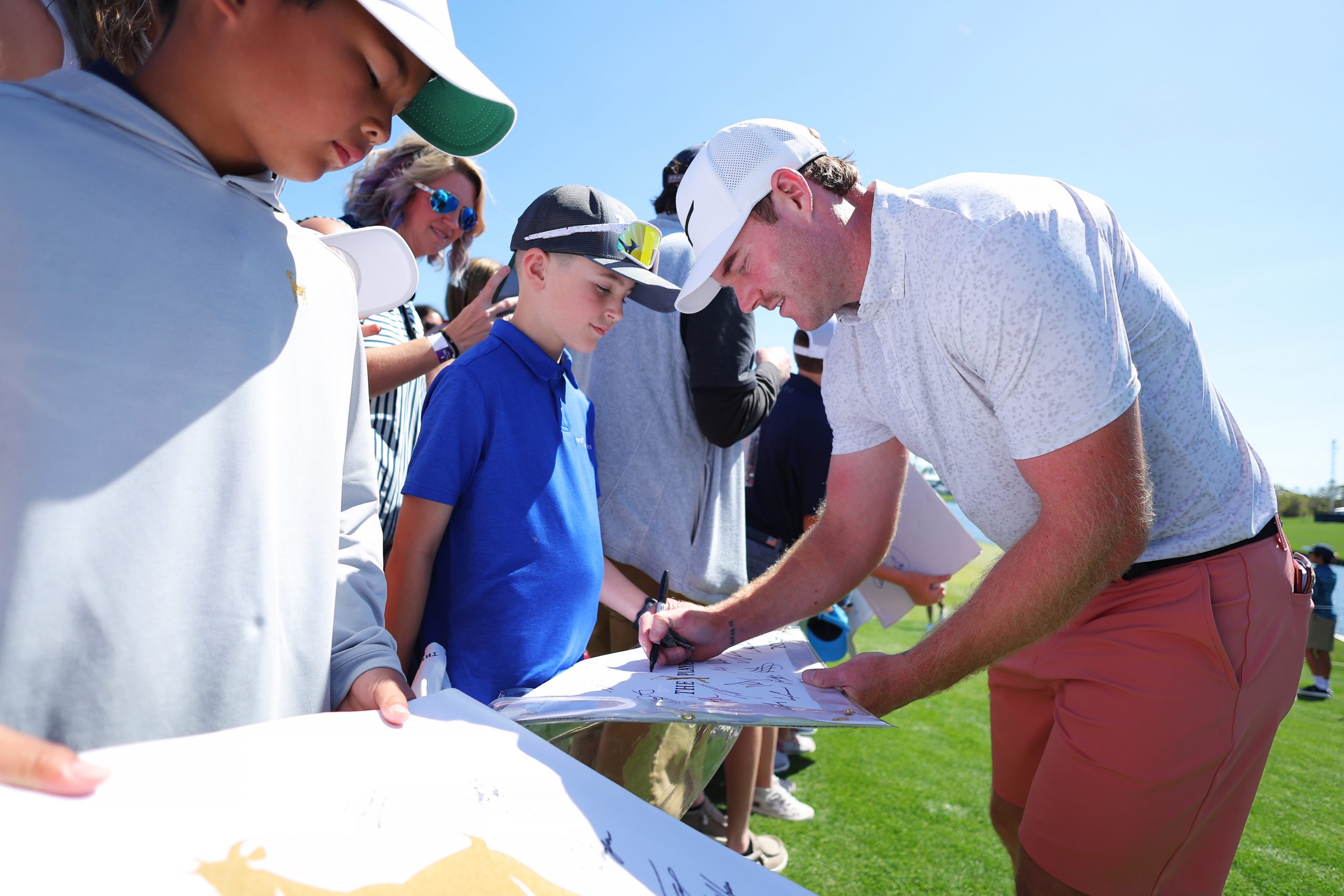 Grayson Murray of the United States signs autographs during a practice round prior to THE PLAYERS Championship on the Stadium Course at TPC Sawgrass on March 12, 2024 in Ponte Vedra Beach, Florida. (Photo by Kevin C. Cox/Getty Images)