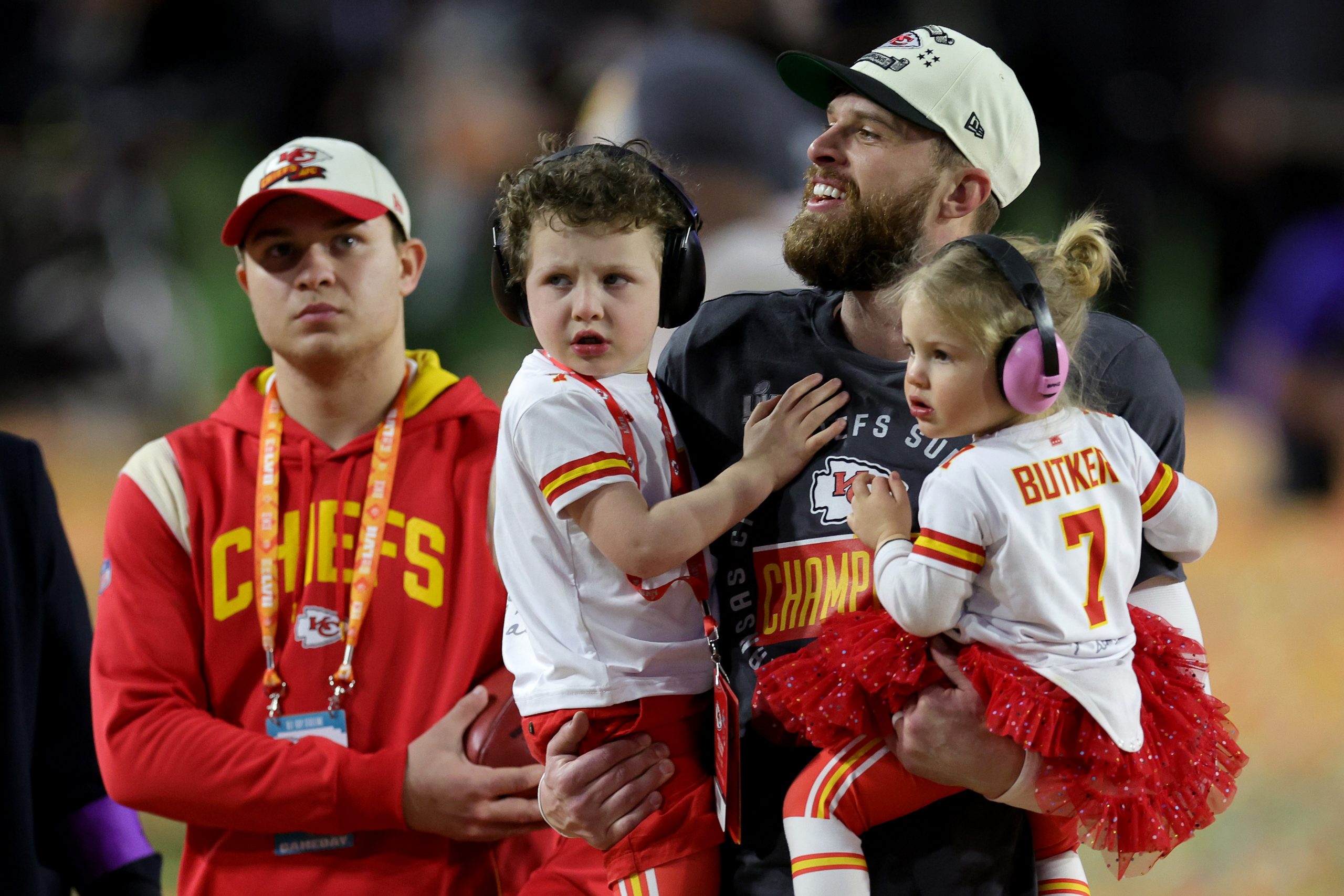 Harrison Butker of the Kansas City Chiefs celebrates with his children.