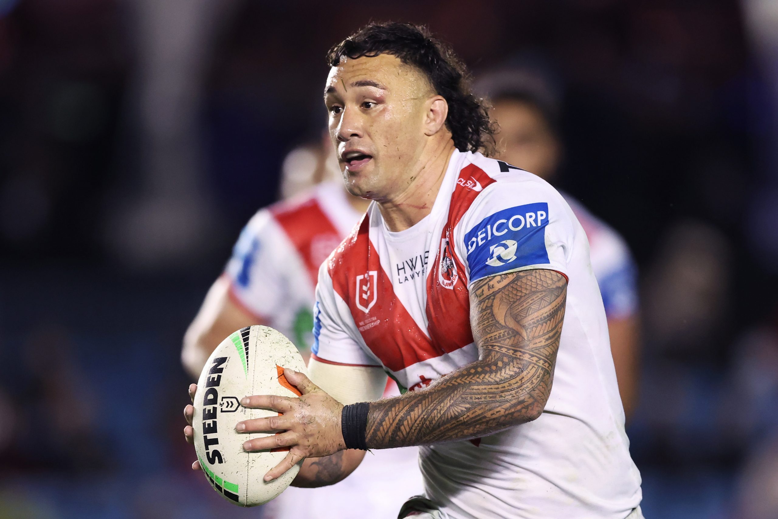 Jaydn Su'a of the Dragons runs with the ball during the round nine NRL match between Cronulla Sharks and St George Illawarra Dragons at PointsBet Stadium, on May 05, 2024, in Sydney, Australia. (Photo by Matt King/Getty Images)