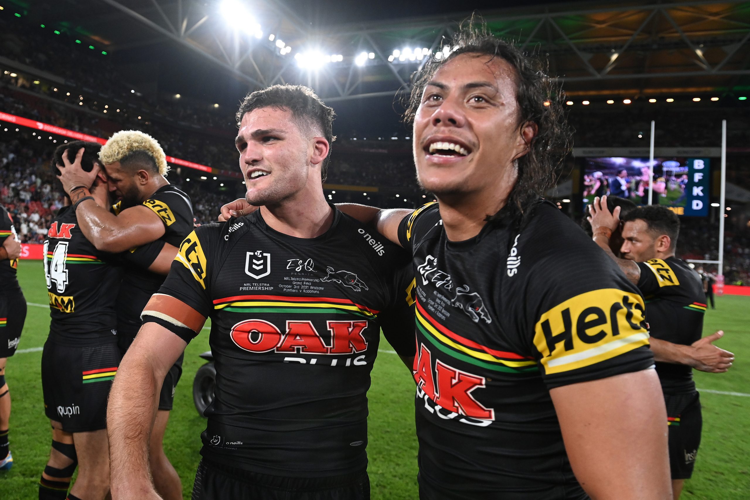 Nathan Cleary of the Panthers and Jarome Luai of the Panthers celebrate winning the 2021 NRL Grand Final match between the Penrith Panthers and the South Sydney Rabbitohs at Suncorp Stadium on October 03, 2021, in Brisbane, Australia. (Photo by Bradley Kanaris/Getty Images)