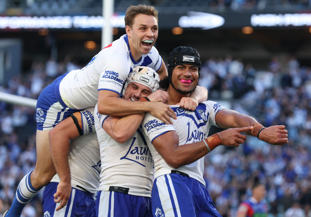 Stephen Crichton of the Bulldogs celebrates after scoring a try.