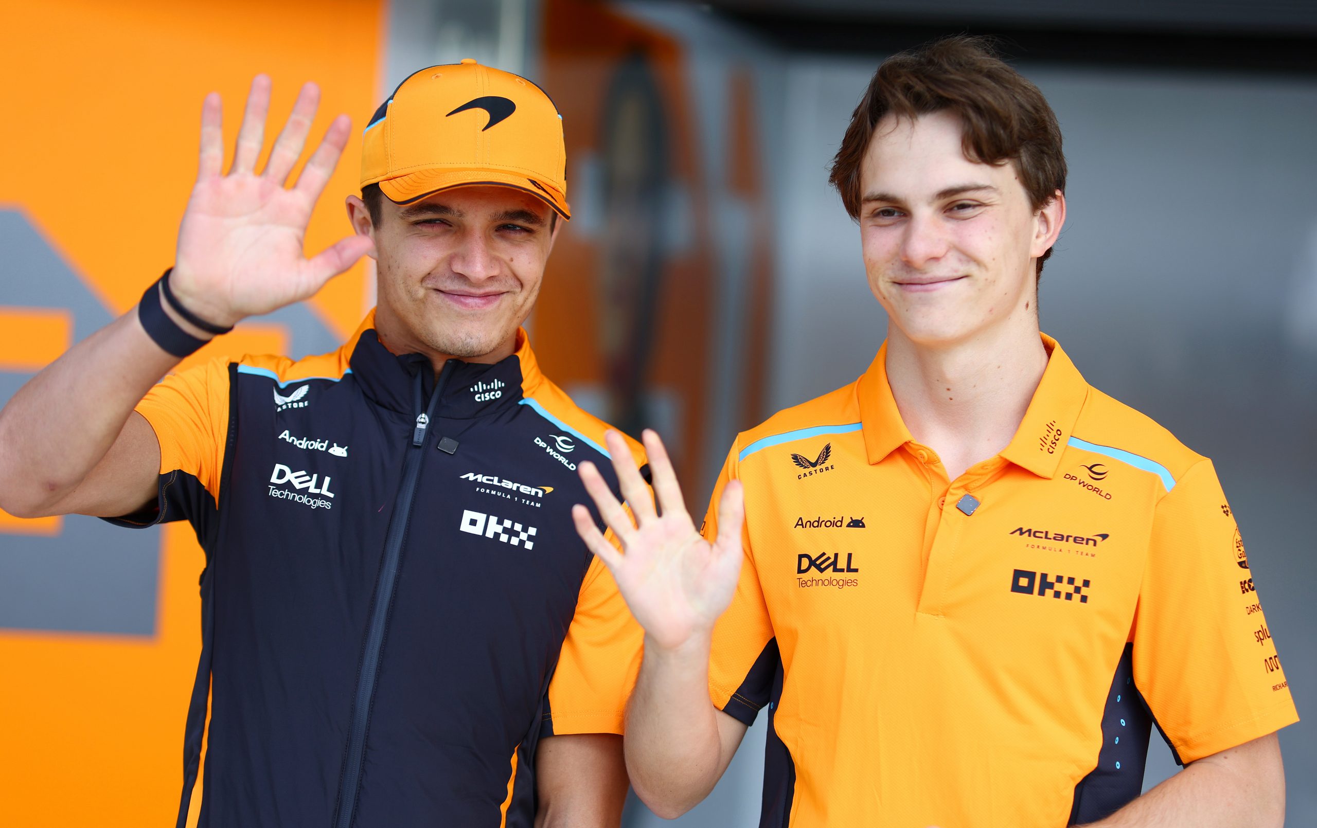 Lando Norris of Great Britain and McLaren and Oscar Piastri of Australia and McLaren look on in the pitlane during previews ahead of the F1 Grand Prix of Japan at Suzuka International Racing Course on April 04, 2024 in Suzuka, Japan. (Photo by Clive Rose - Formula 1/Formula 1 via Getty Images)