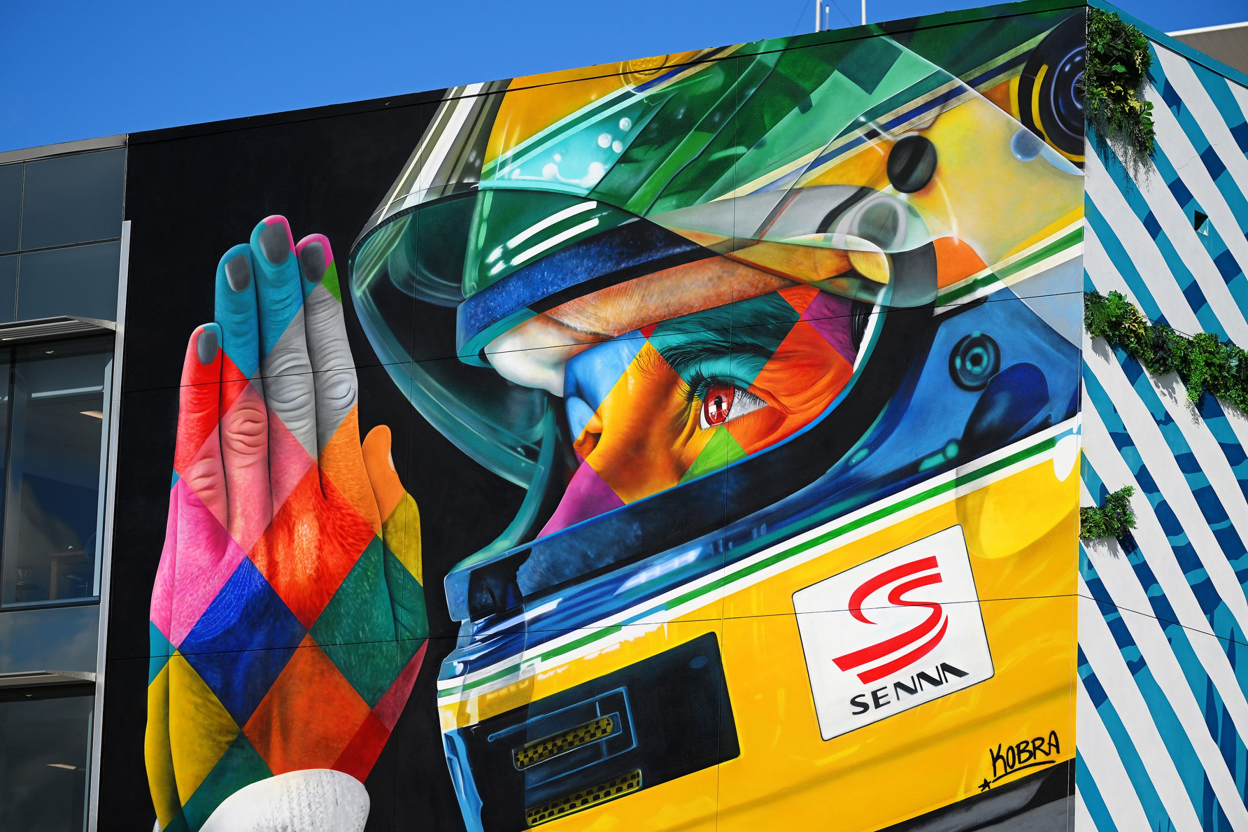 A mural of Ayrton Senna in the paddock area of the 2024 Miami Grand Prix, commemorating the 30th anniversary of his death.