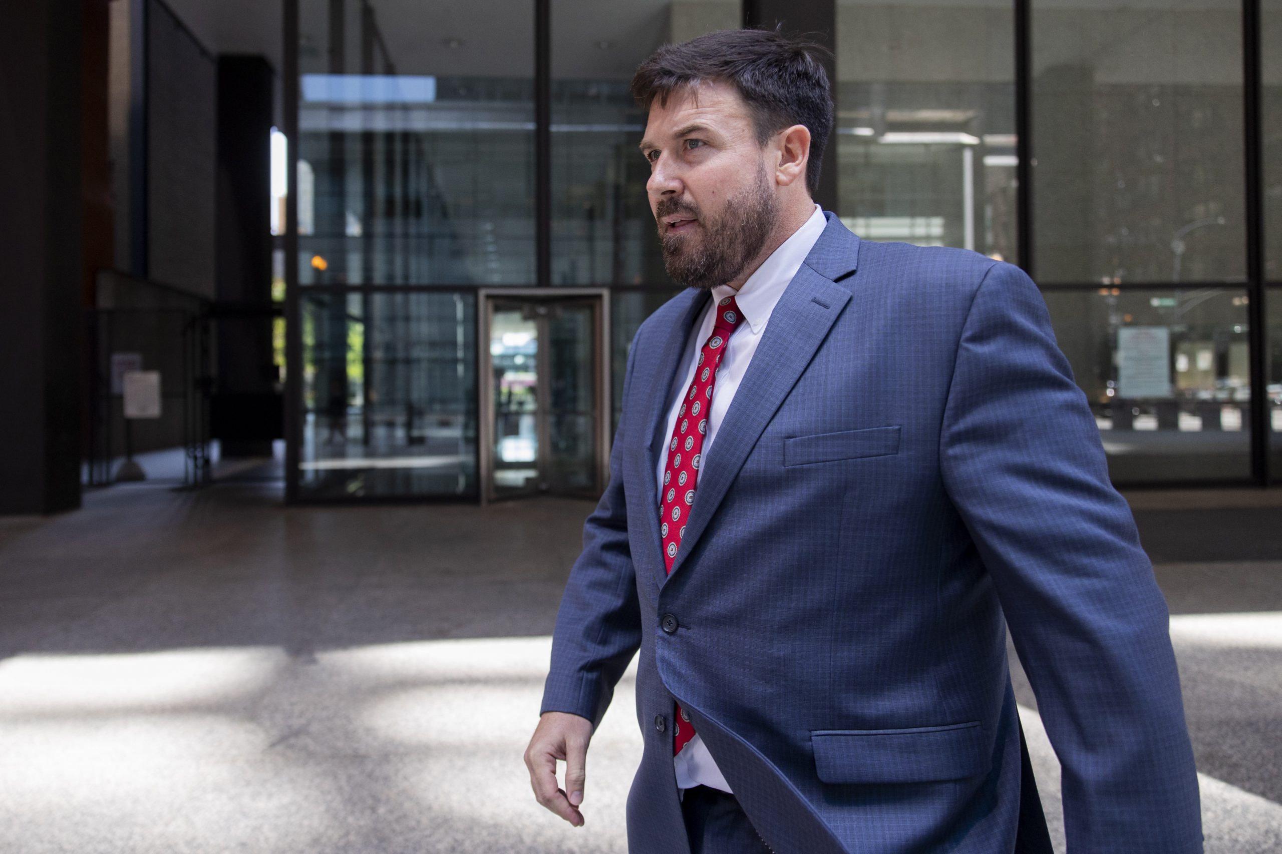 Richard Globensky, of Augusta, walks out of the Dirksen US Courthouse.