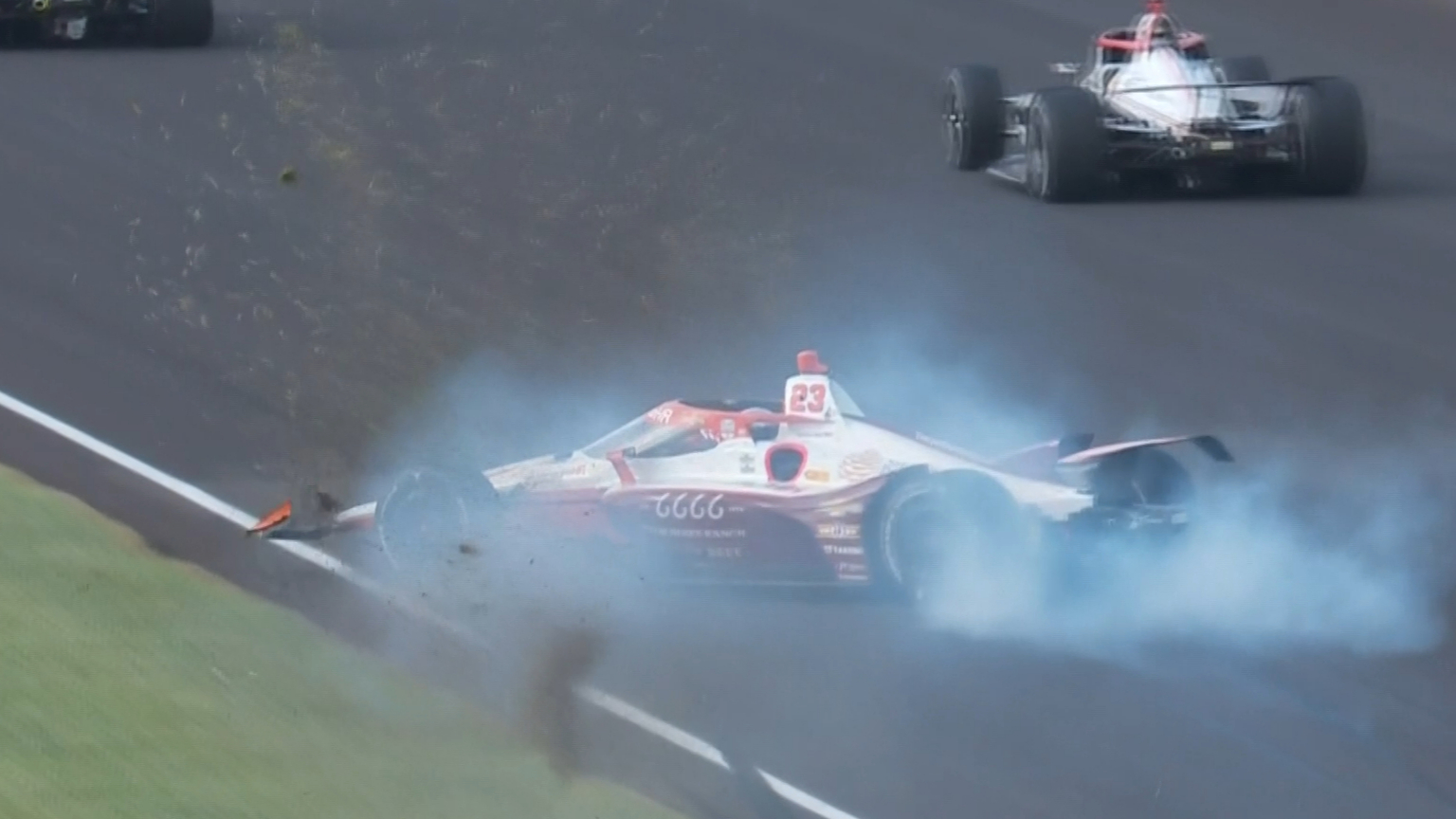 IndyCar champ goes for scary 360-degree spin