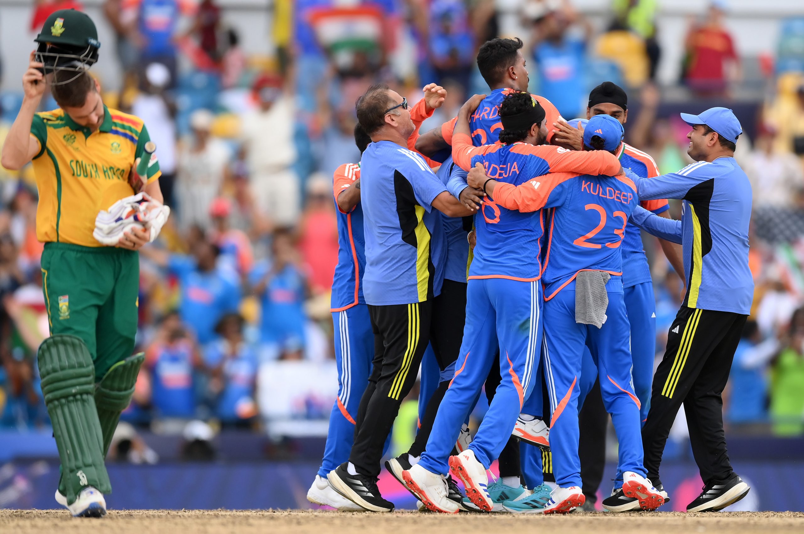 Players of India celebrate victory after winning the ICC Men's T20 Cricket World Cup following the ICC Men's T20 Cricket World Cup West Indies & USA 2024 Final match between South Africa and India at Kensington Oval on June 29, 2024 in Bridgetown, Barbados. (Photo by Alex Davidson-ICC/ICC via Getty Images)