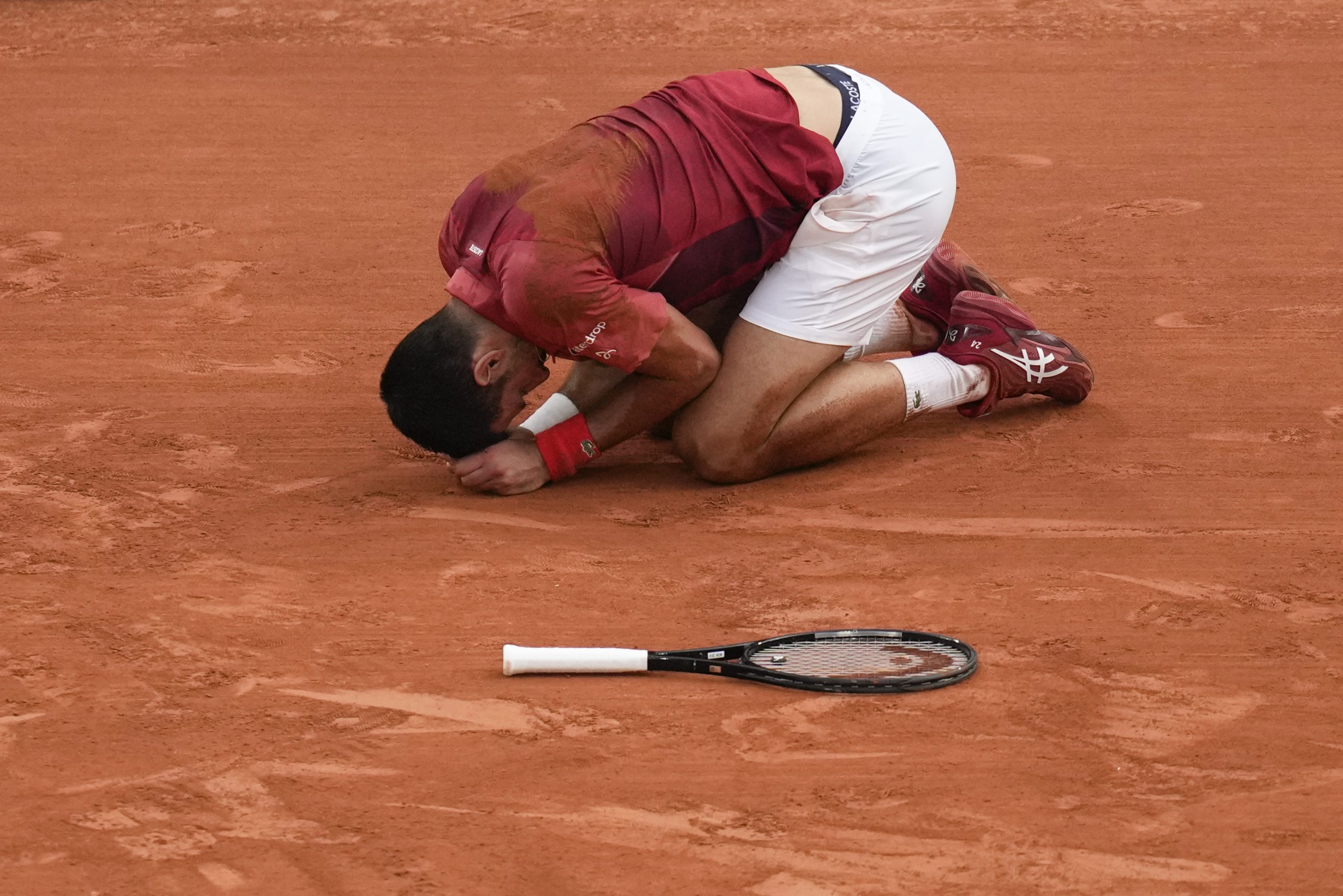 Serbia's Novak Djokovic slipped and fell during his fourth round match of Roland-Garros against Argentina's Francisco Cerundolo.