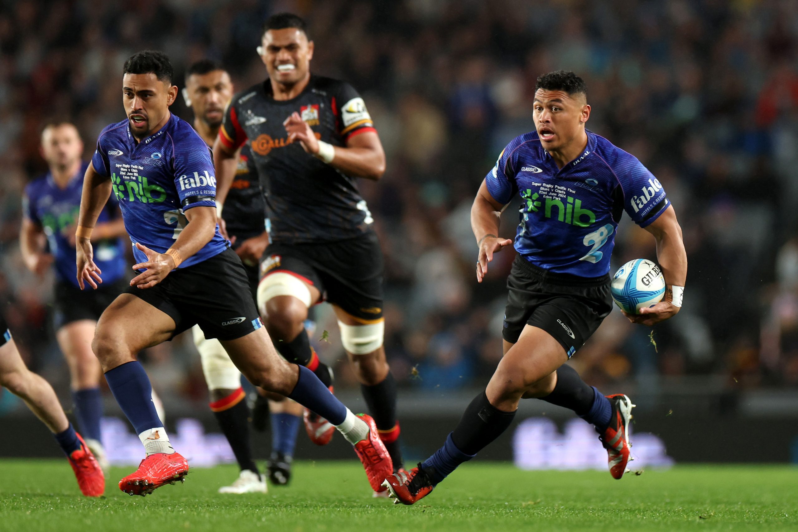 Caleb Clarke of the Blues charges forward.