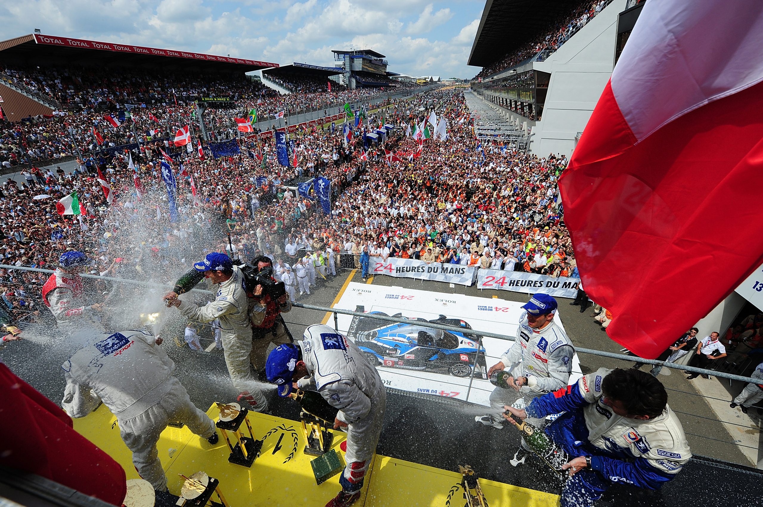 David Brabham and his teammates celebrate winning the 24 Hours of Le Mans.