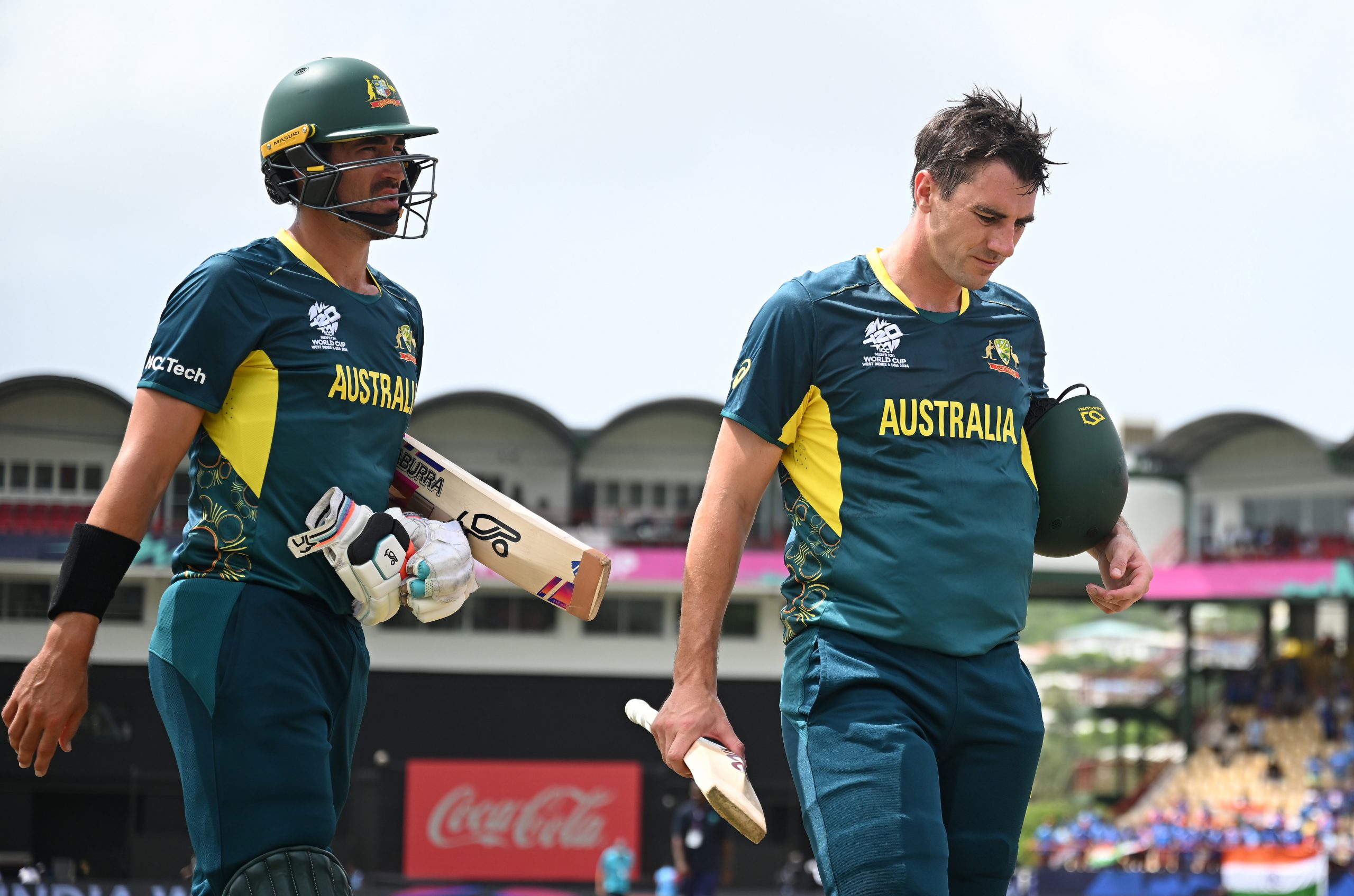 Pat Cummins and Mitchell Starc of Australia cut dejected figures following the loss to India.