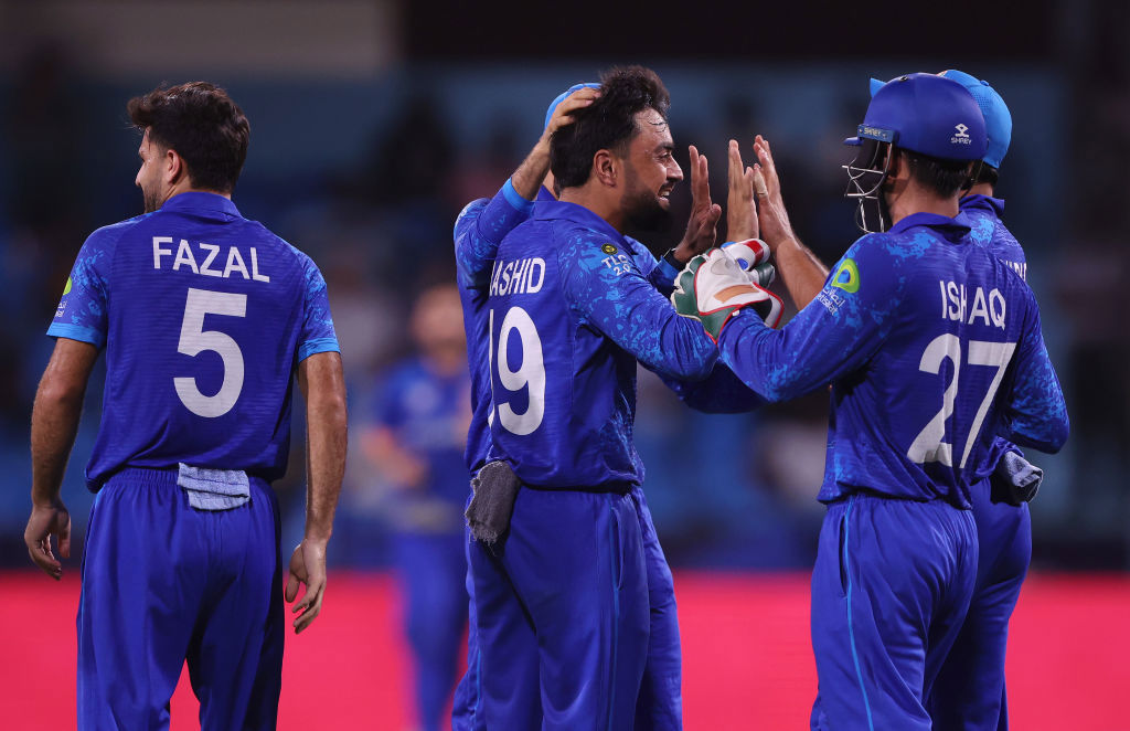 Rashid Khan celebrates with teammates after dismissing Soumya Sarkar of Bangladesh (not pictured).