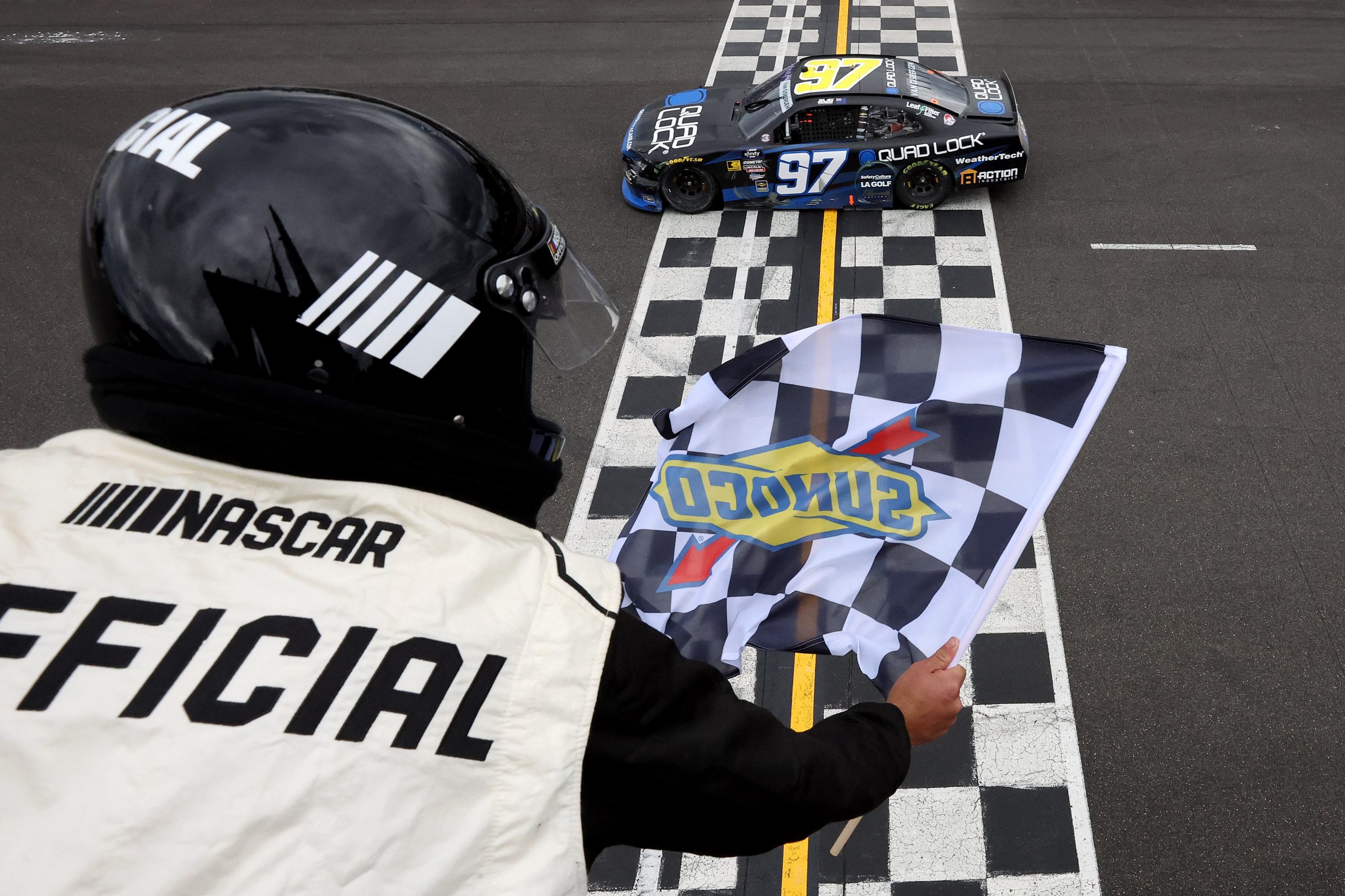 Shane Van Gisbergen, driver of the #97 Quad Lock Chevrolet, takes the checkered flag to win the NASCAR Xfinity Series Pacific Office Automation 147 at Portland International Raceway on June 01, 2024 in Portland, Oregon. (Photo by Meg Oliphant/Getty Images)