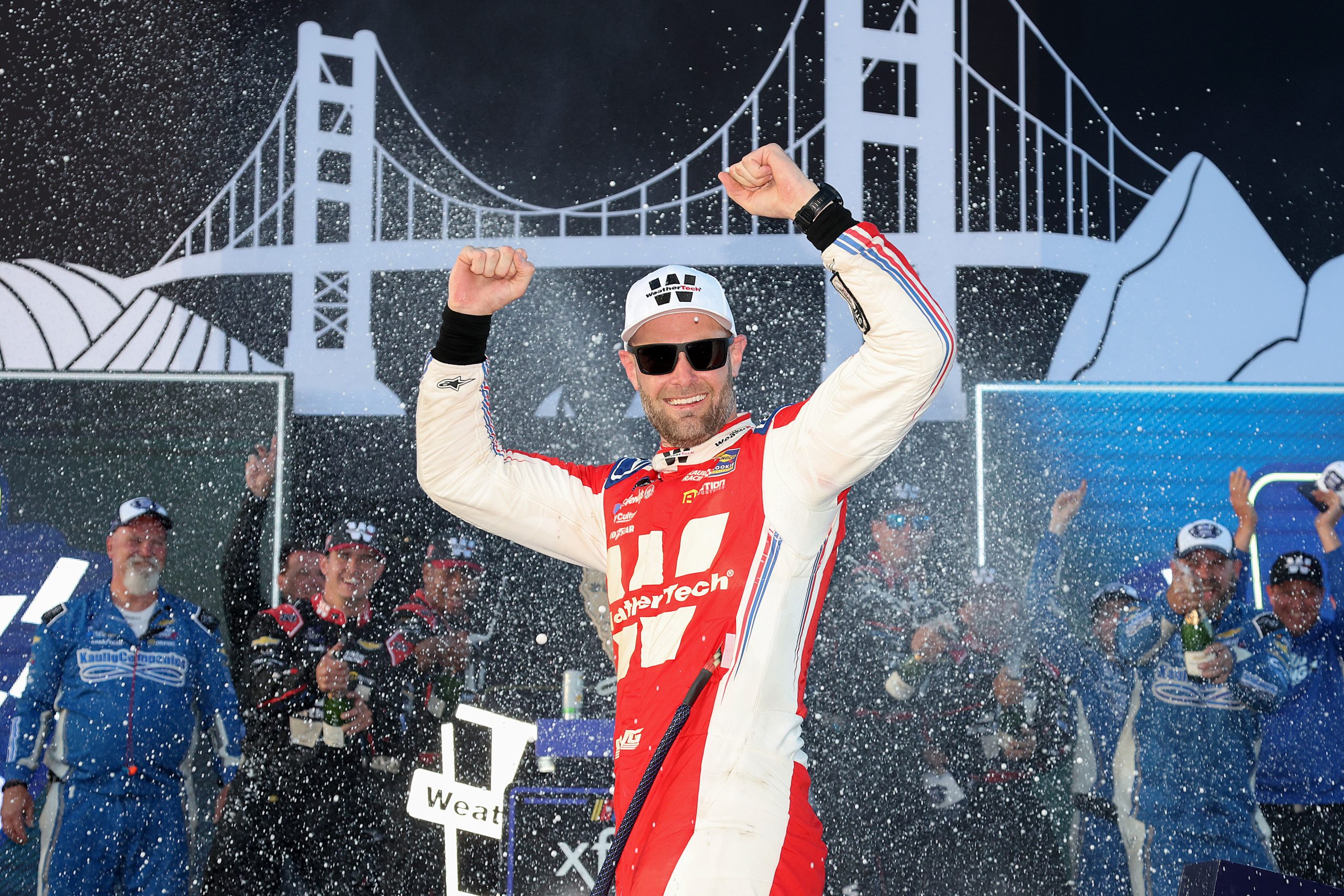 Shane Van Gisbergen, driver of the #97 WeatherTech Chevrolet, celebrates in victory lane after winning the NASCAR Xfinity Series Zip Buy Now, Pay Later 250 at Sonoma Raceway on June 08, 2024 in Sonoma, California. (Photo by Meg Oliphant/Getty Images)